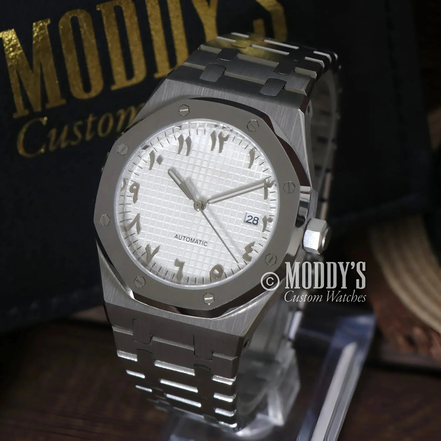 Gray wristwatch with Arabic numerals from Royal Seikoak featuring Seiko NH35 automatic