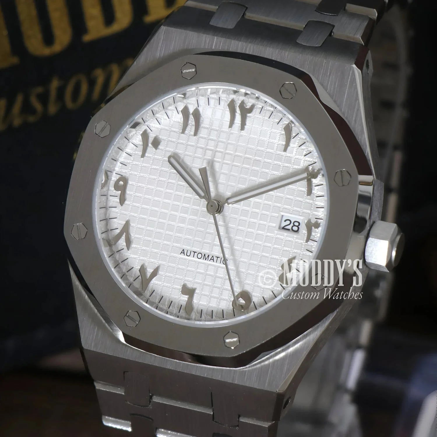 Silver Royal Seikoak wristwatch with Arabic numerals and Seiko NH35 automatic movement