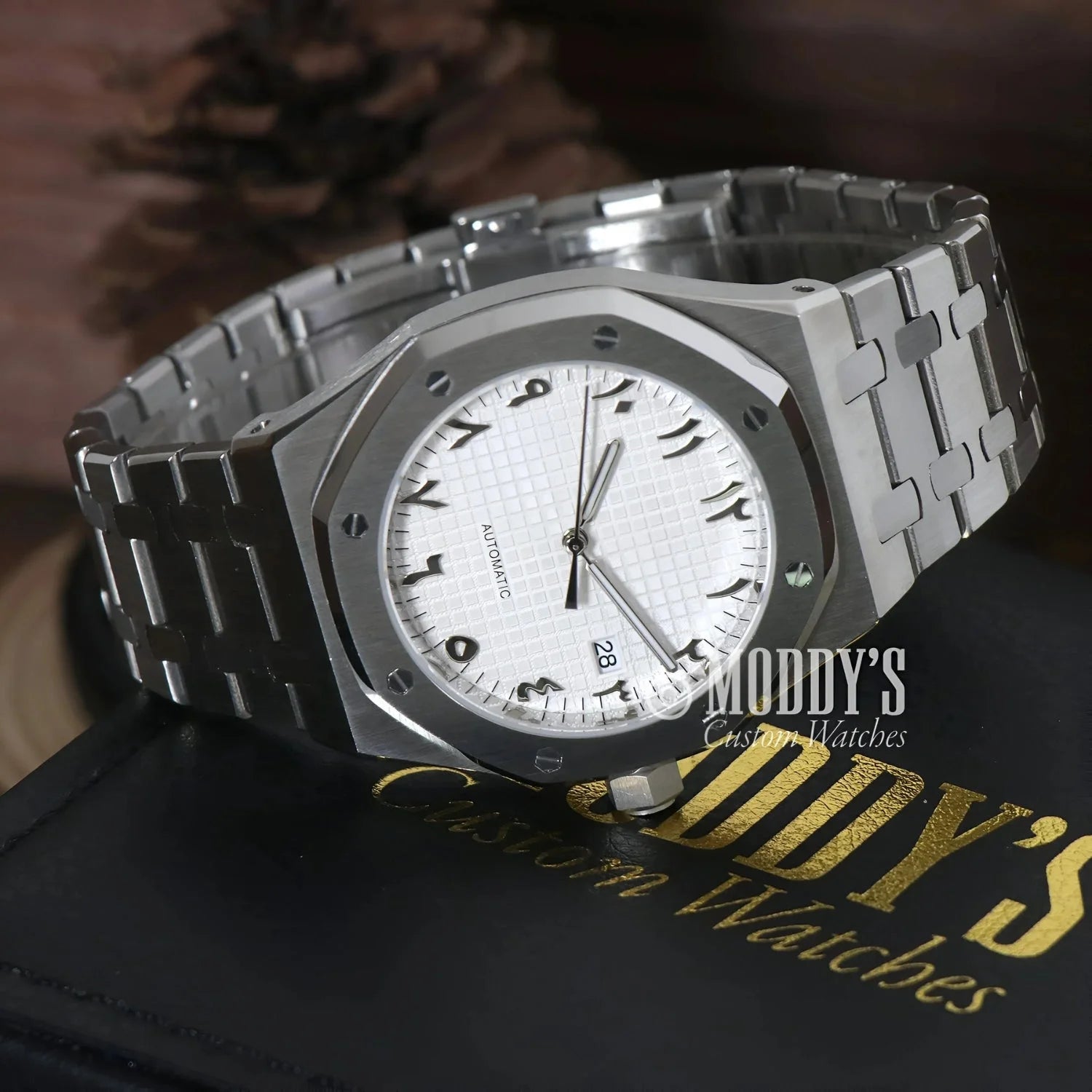 Silver wristwatch with Arabic numerals, Royal Seikoak, featuring Seiko NH35 Automatic movement
