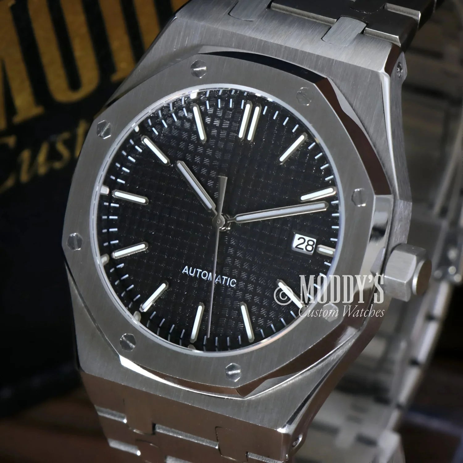 Silver-toned automatic wristwatch from Royal Seikoak featuring NH35 automatic movement