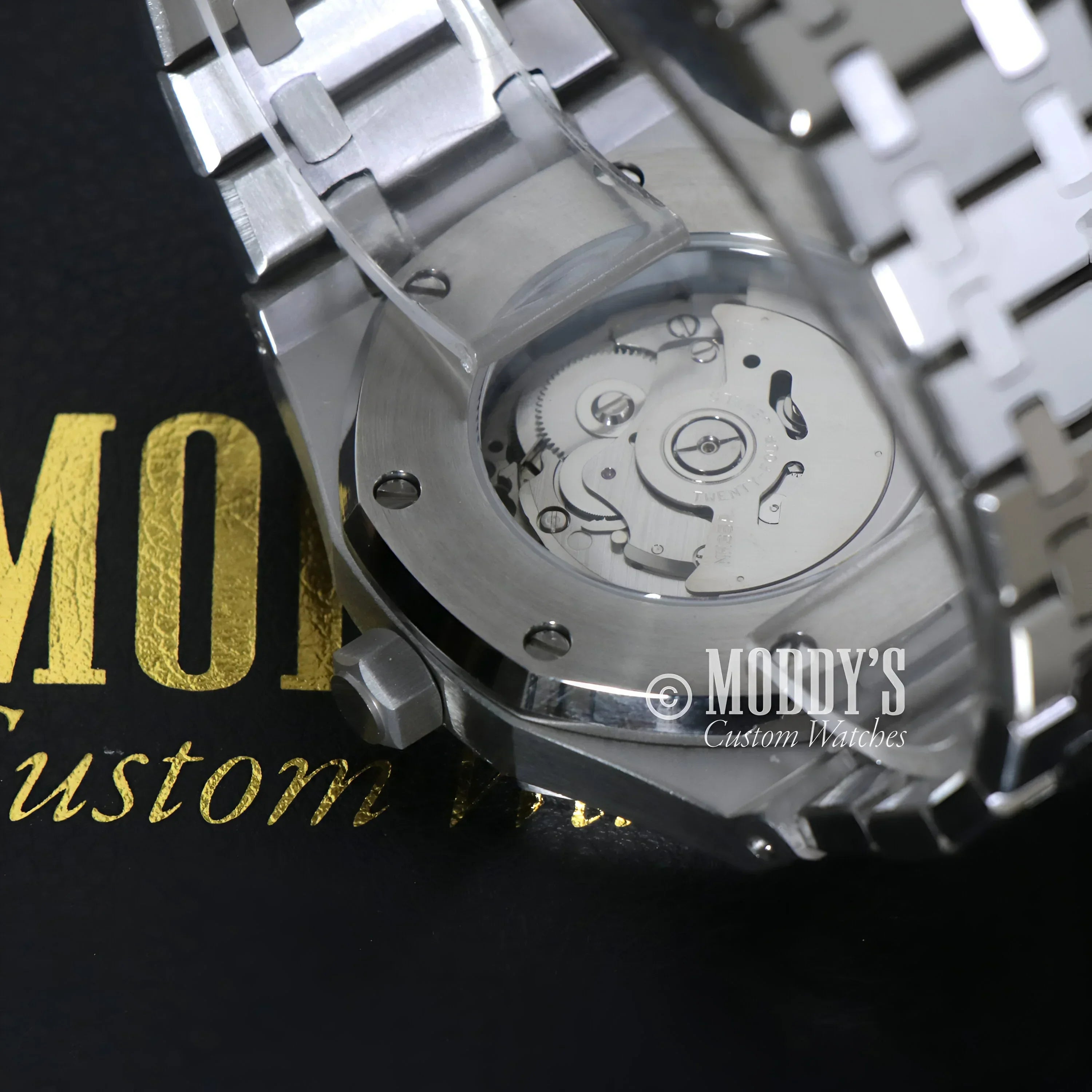 Silver Royal Seikoak wristwatch showcasing NH35 automatic movement detail