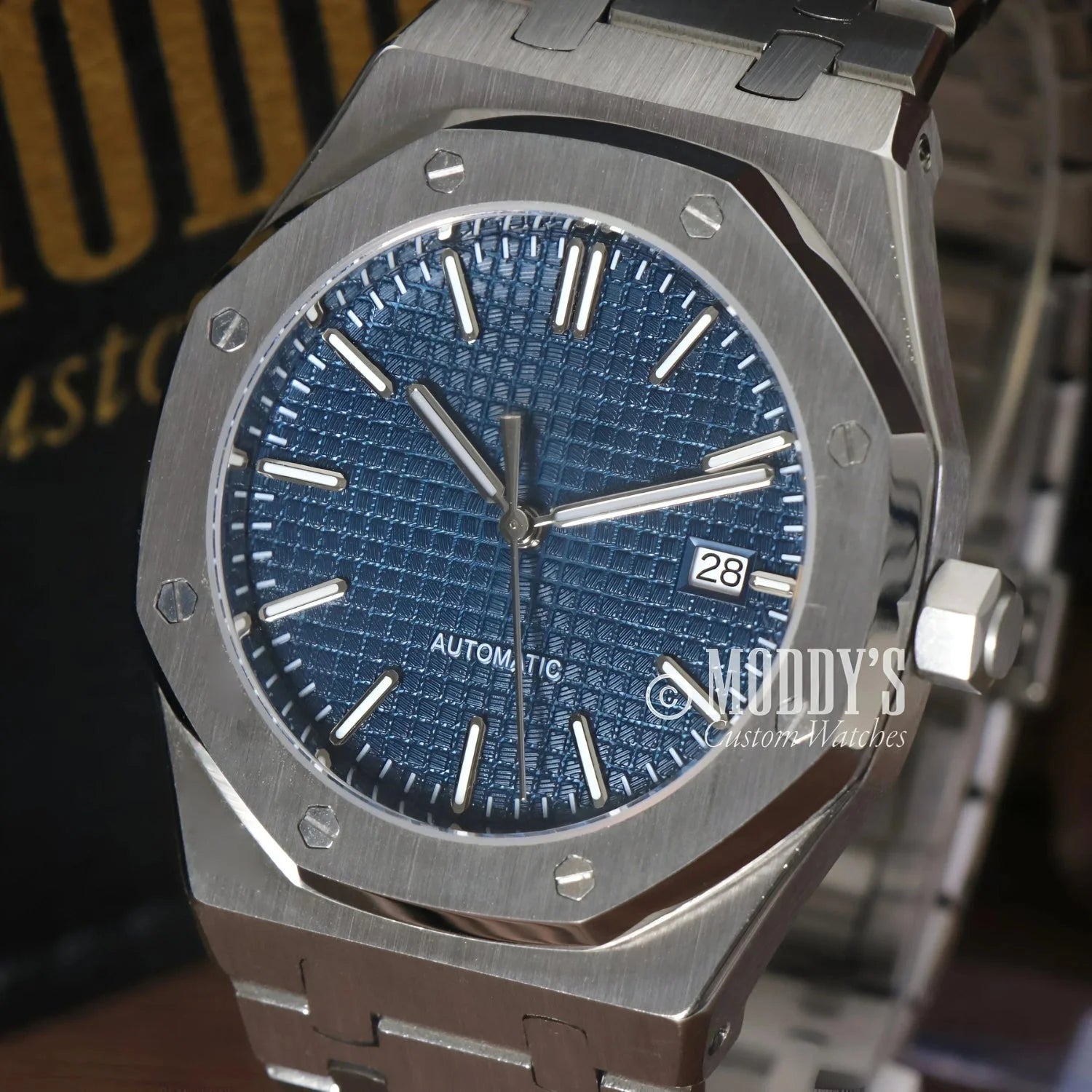 Silver Seiko Mod Royal wristwatch with blue patterned face and NH35 automatic movement