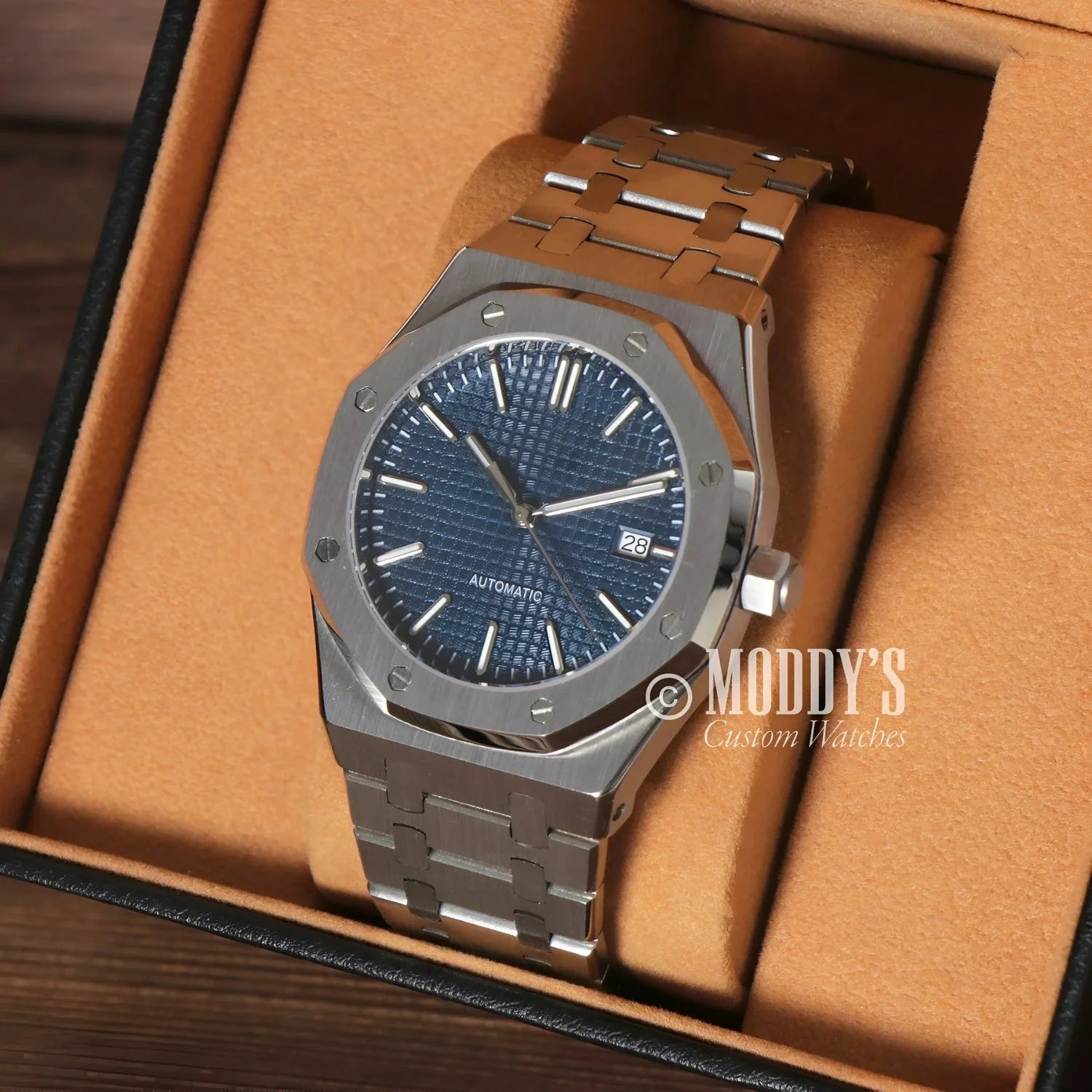 Silver automatic wristwatch with blue dial from Seiko Mod Royal Oak collection