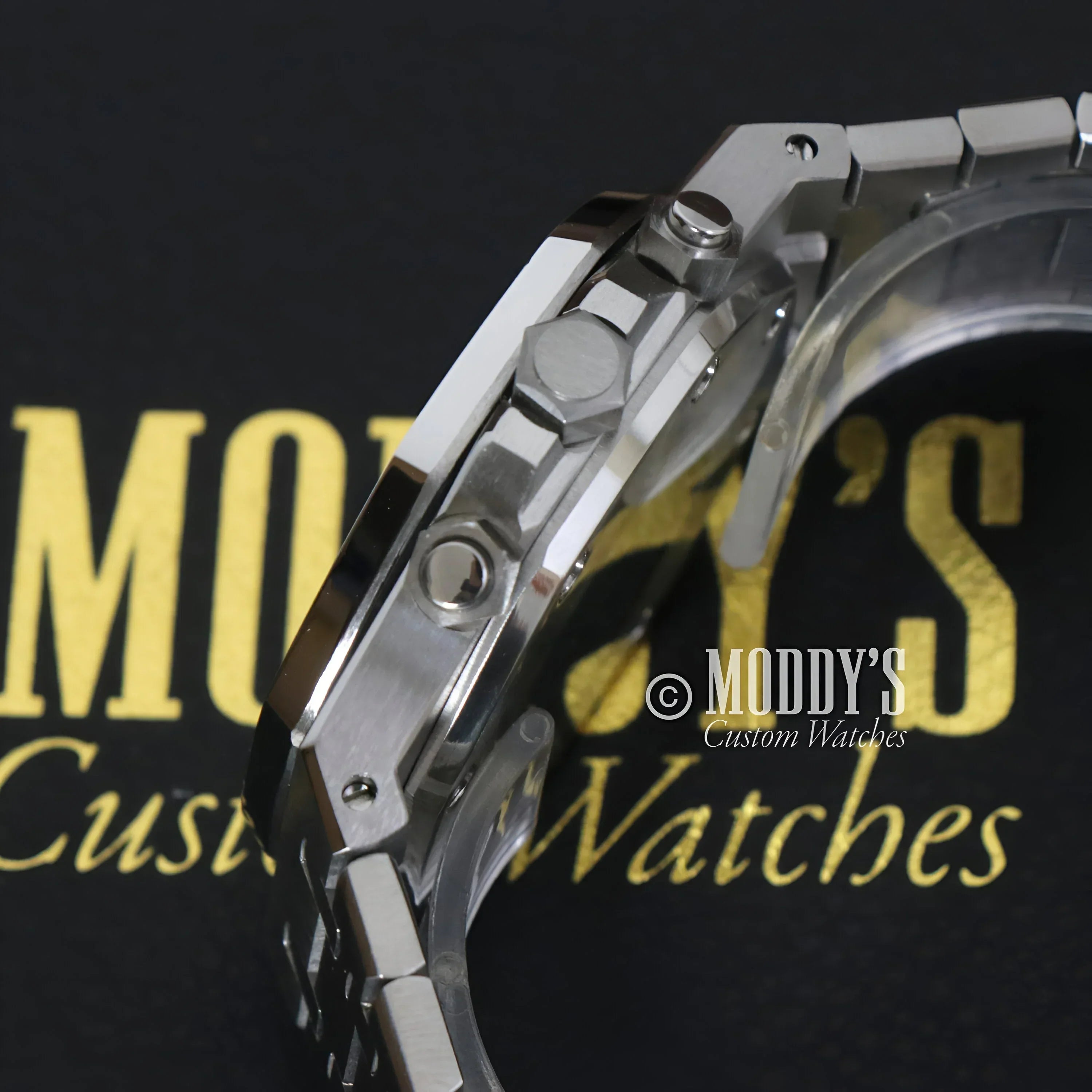 Silver wristwatch with metal band, Seiko Mod Royal Oak featuring VK63 hybrid movement