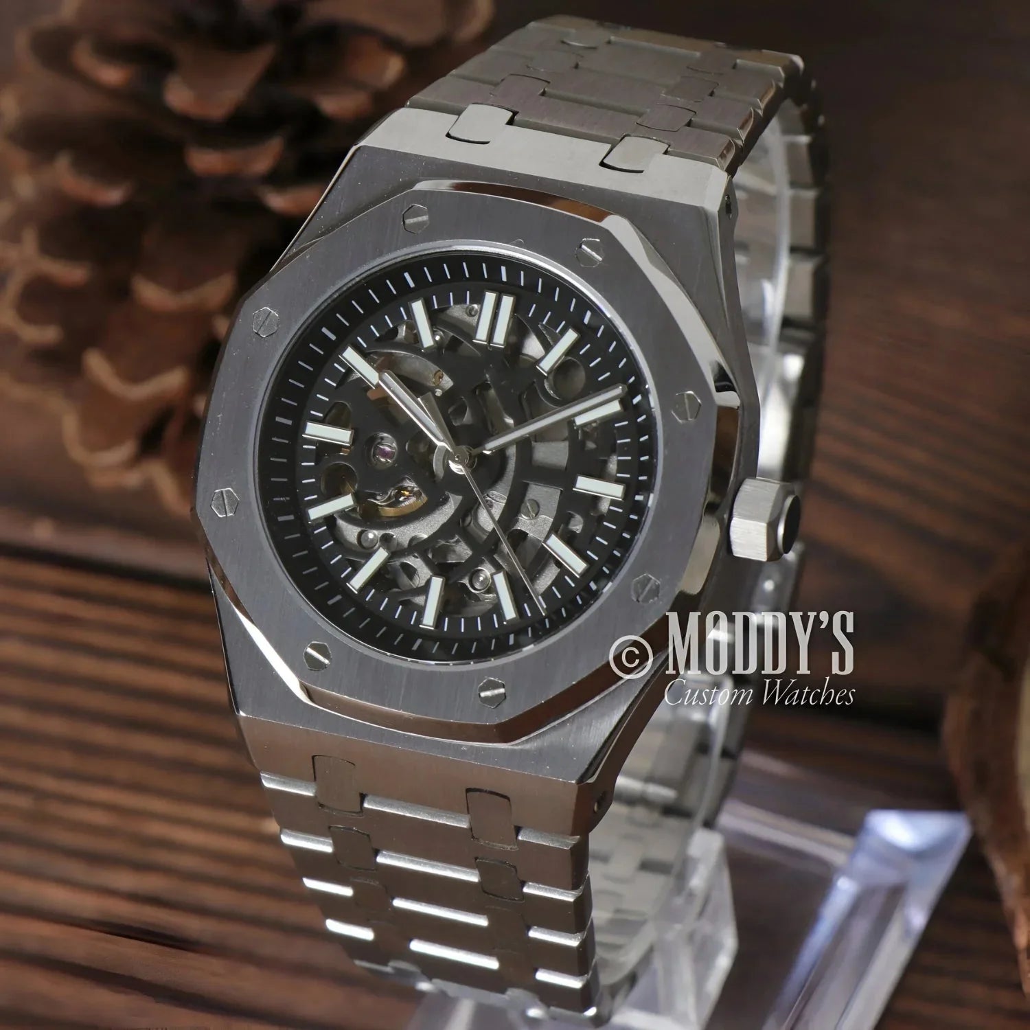 Silver skeleton-dial wristwatch from Royal Seikoak featuring Seiko NH70 automatic movement