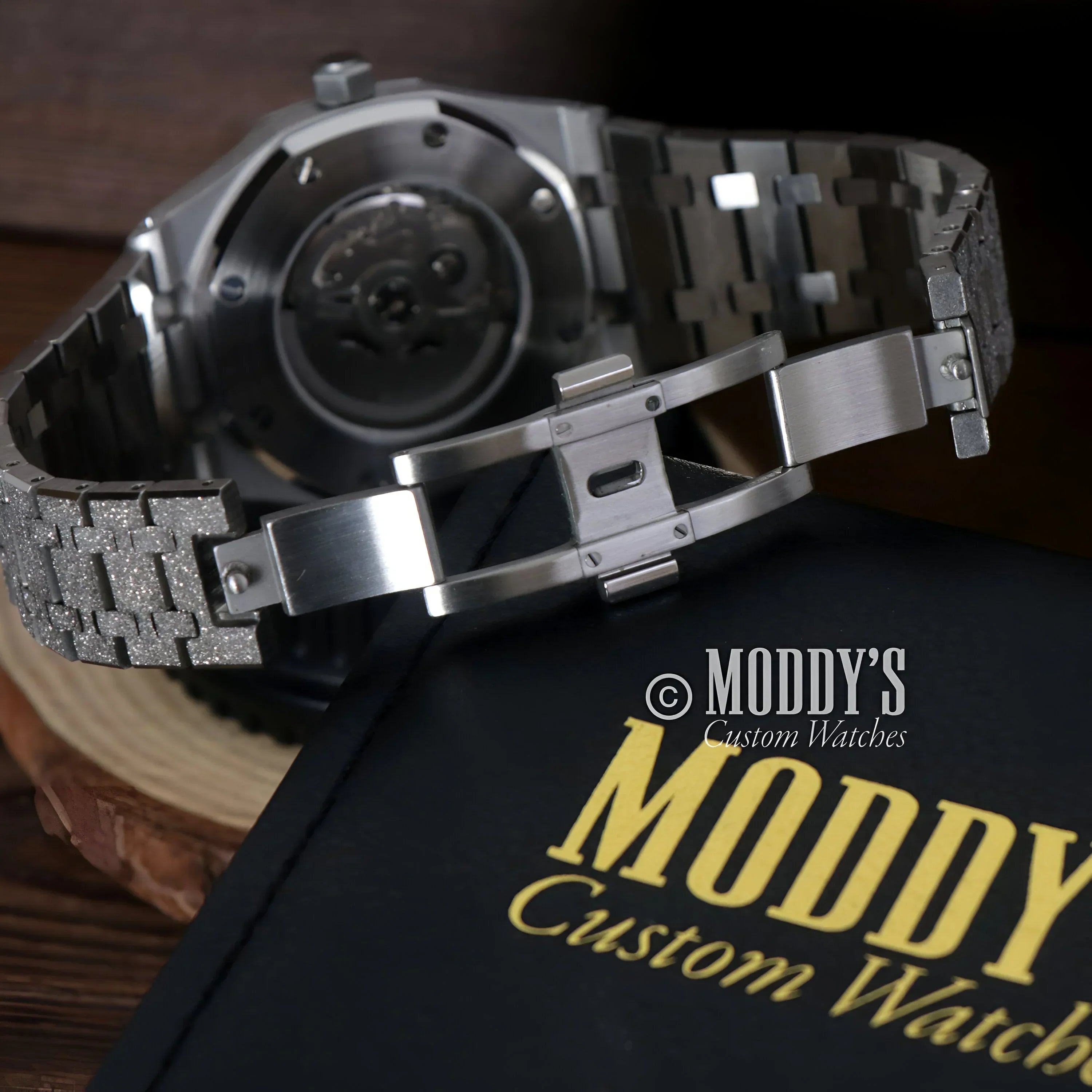 Silver wristwatch with diamond-studded band from Royal Seikoak featuring NH35 automatic movement
