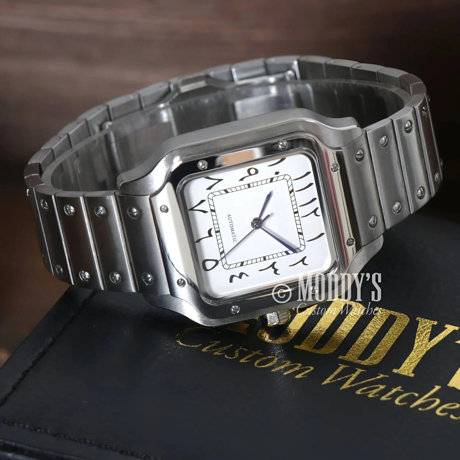 Silver wristwatch with white face, featuring NH35 automatic movement, Arabic White style
