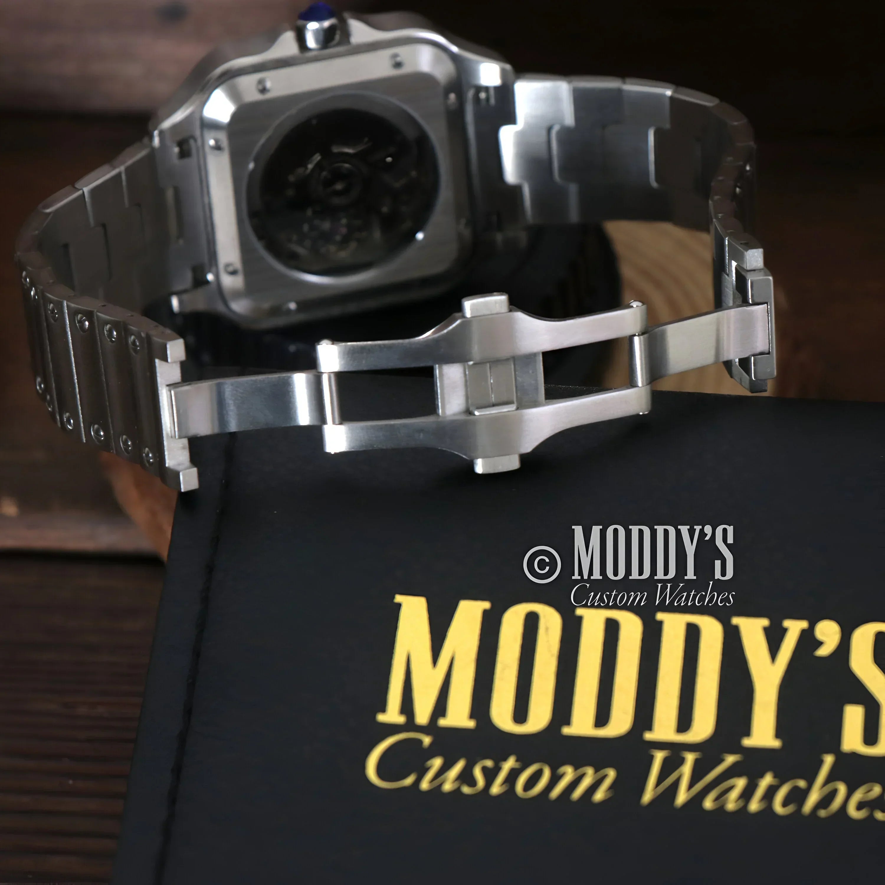 Silver wristwatch with metal band, featuring NH35 automatic movement and Arabic White design