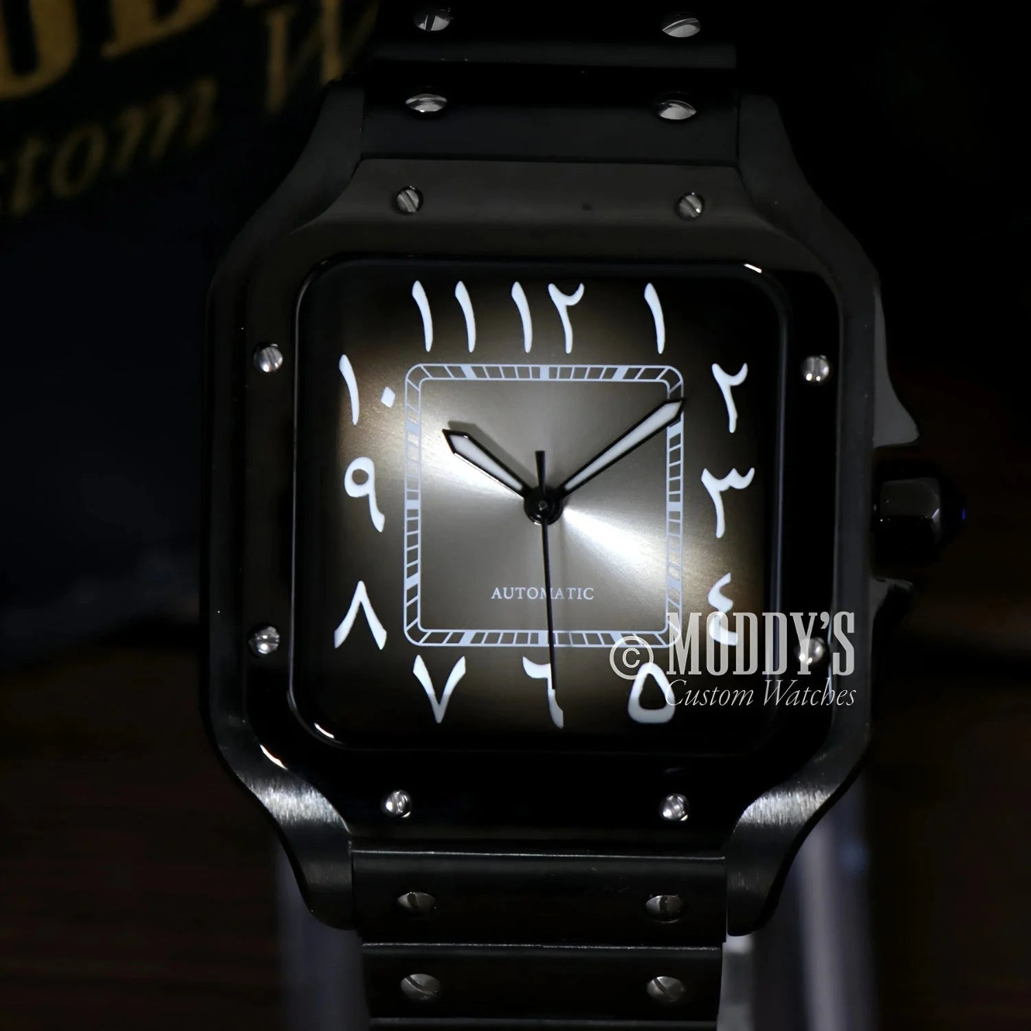 Black wristwatch with Arabic numerals from Santeiko featuring NH35 automatic movement