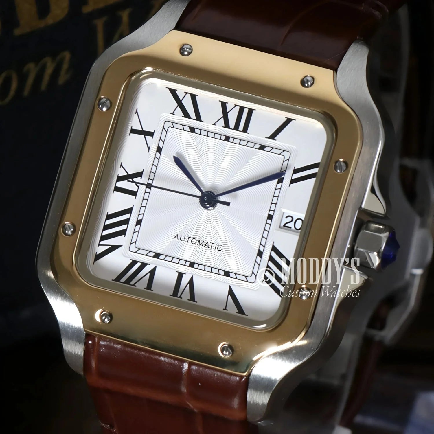 Two-tone square wristwatch with brown leather band, featuring Seiko NH35 automatic movement