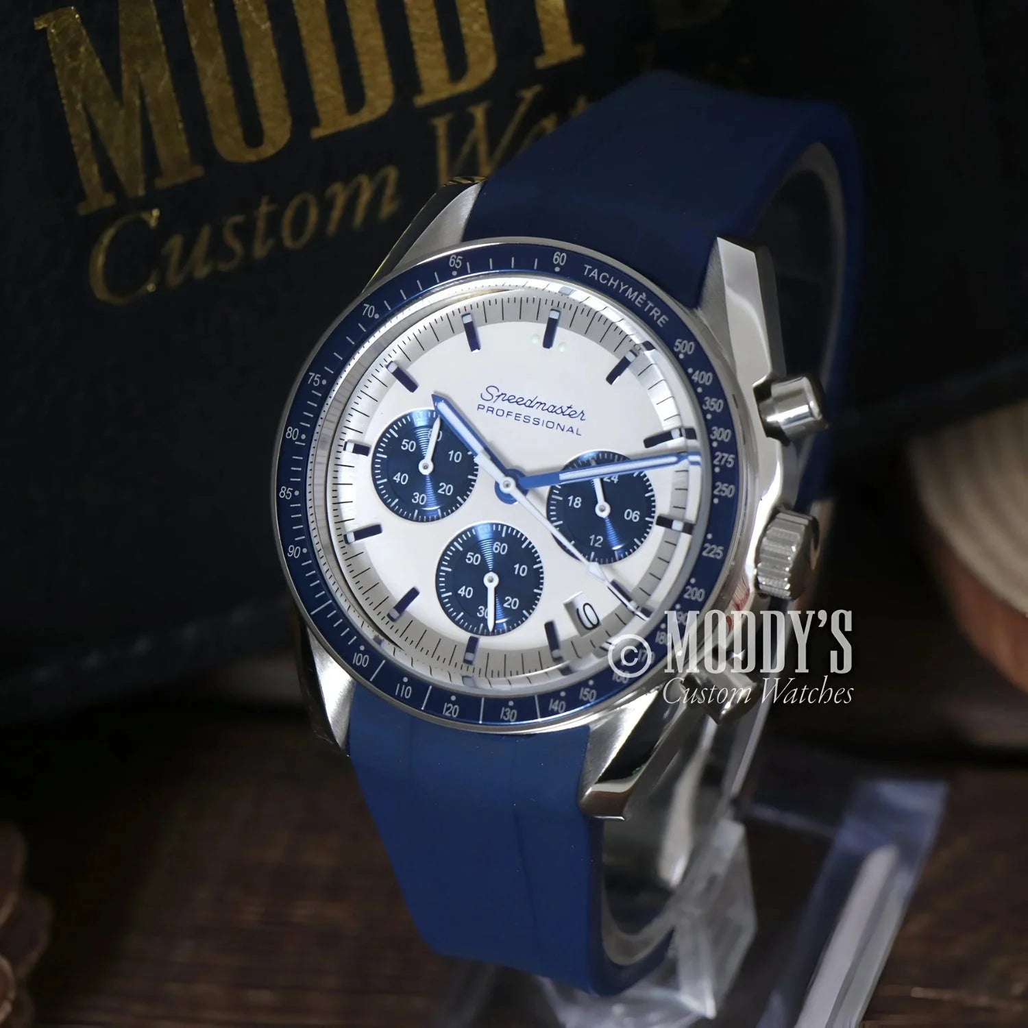 Silver and white chronograph wristwatch with blue accents from Seiko Mod Speedmaster Snoopy Blue