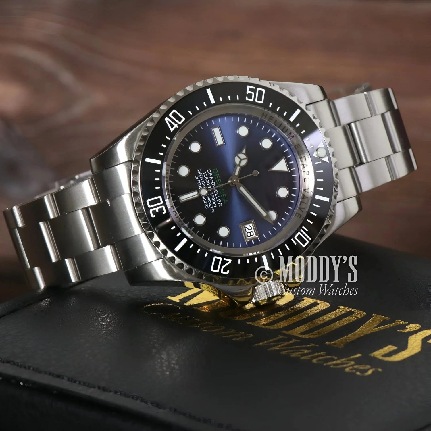 Silver Seiko Mariner Deepsea wristwatch with black bezel featuring Seiko NH35 automatic