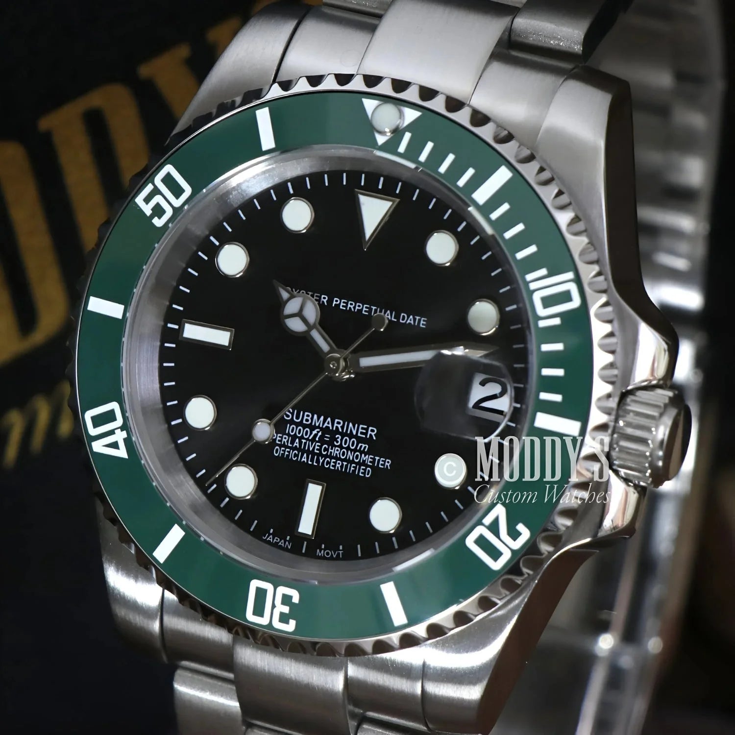 Silver and green Submariner watch from Seikomariner, a stylish Seiko mod with NH35 automatic