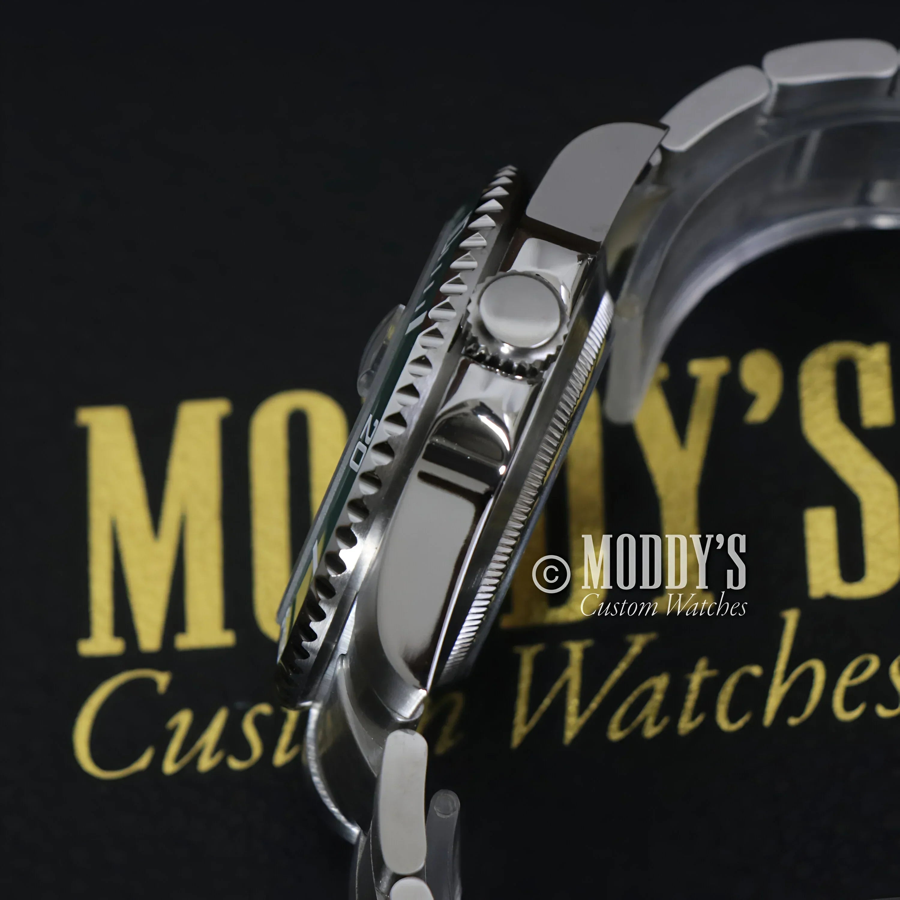 Silver Seikomariner Kermit wristwatch with rotating bezel, featuring Seiko NH35 automatic