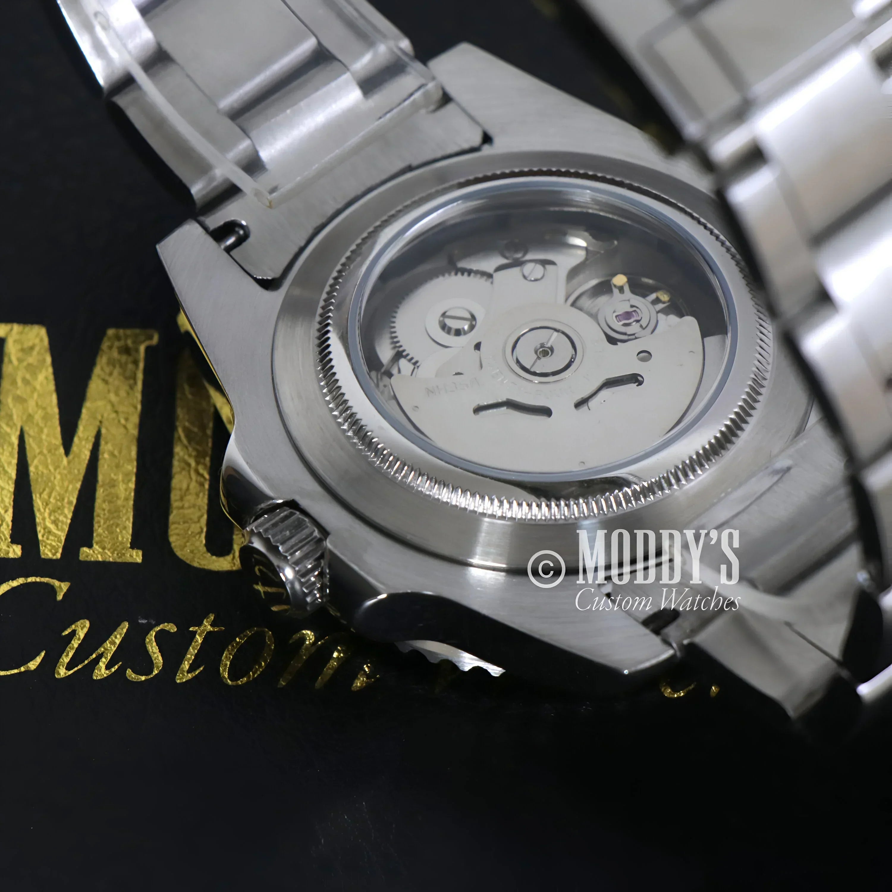 Silver Seikomariner Kermit wristwatch showcasing Seiko NH35 automatic movement