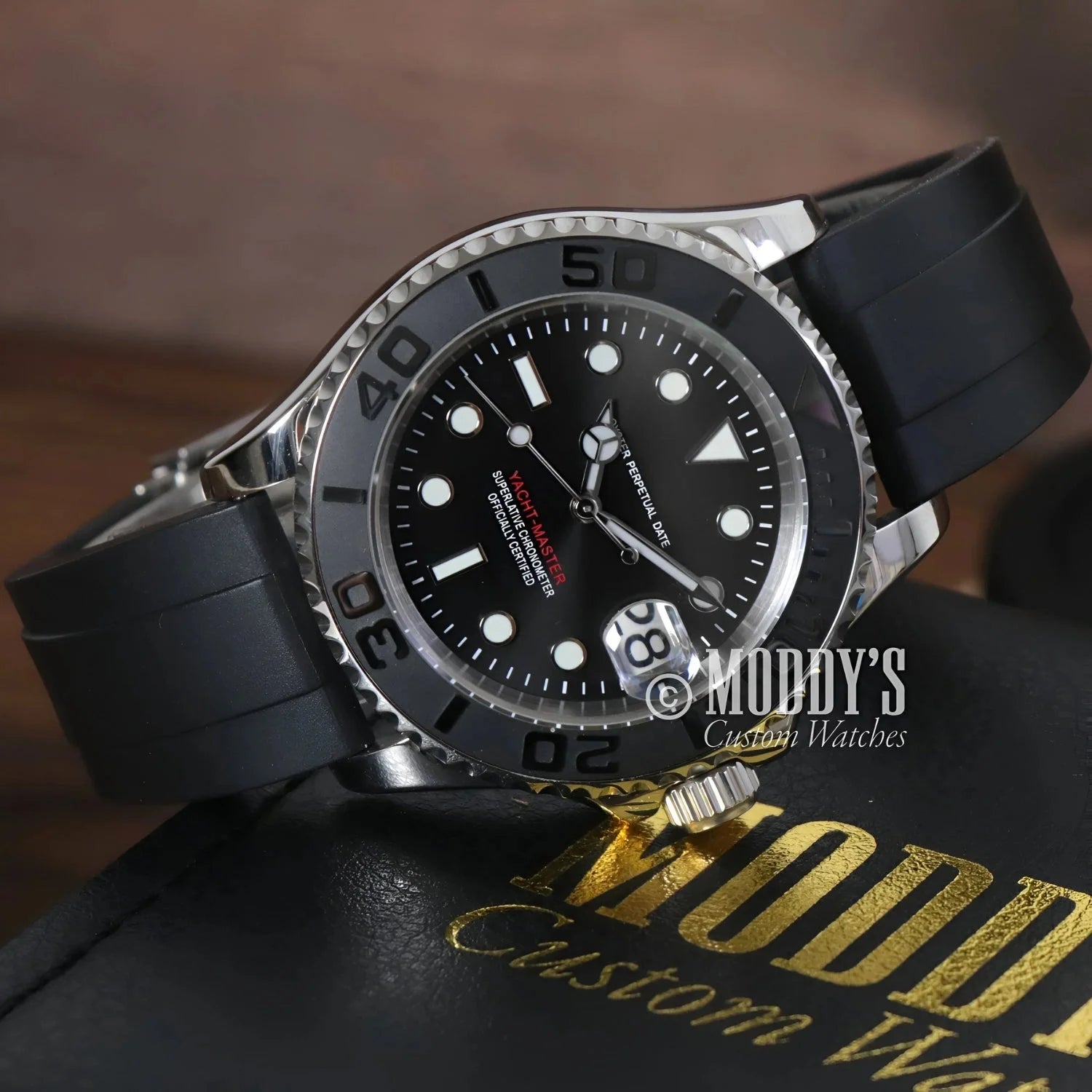 Silver and black Seikomariner wristwatch with rubber strap featuring NH35 automatic movement