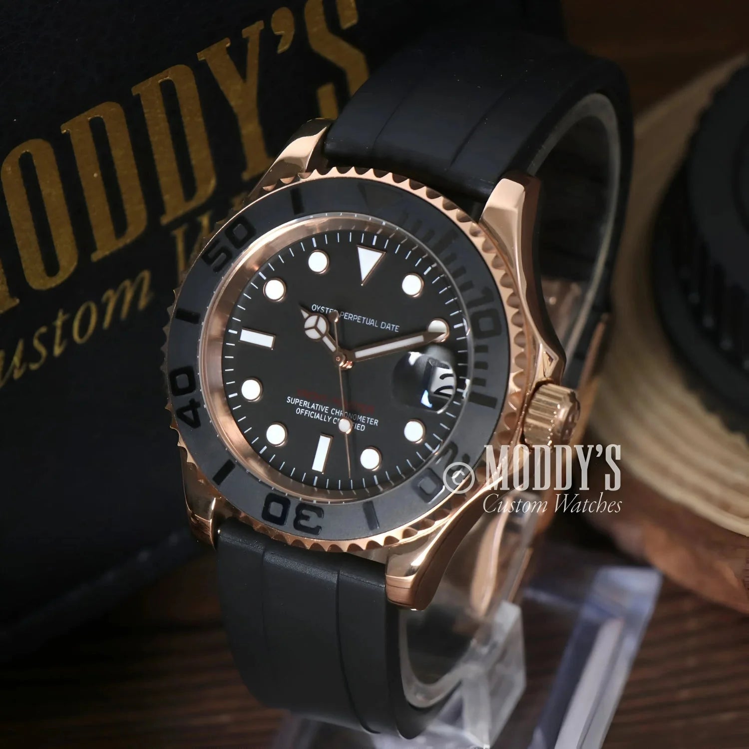 Gold and black wristwatch Seikomariner with NH35 automatic movement and Seiko mod style