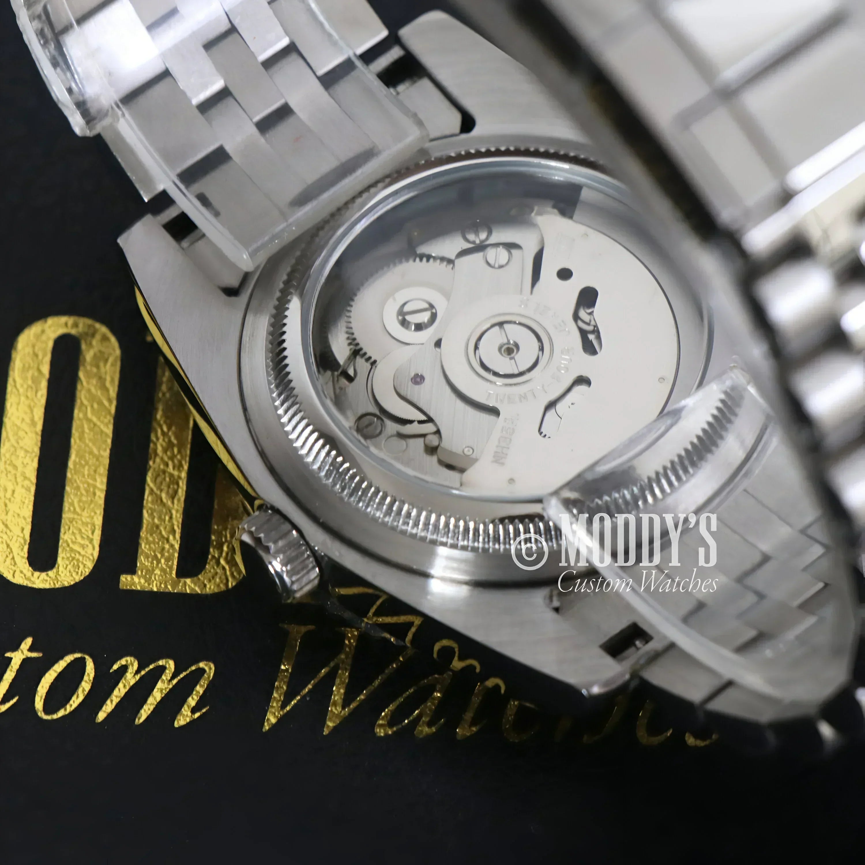 Silver automatic wristwatch from Seikojust featuring Arabic Royal Blue and Seiko NH35 Automatic