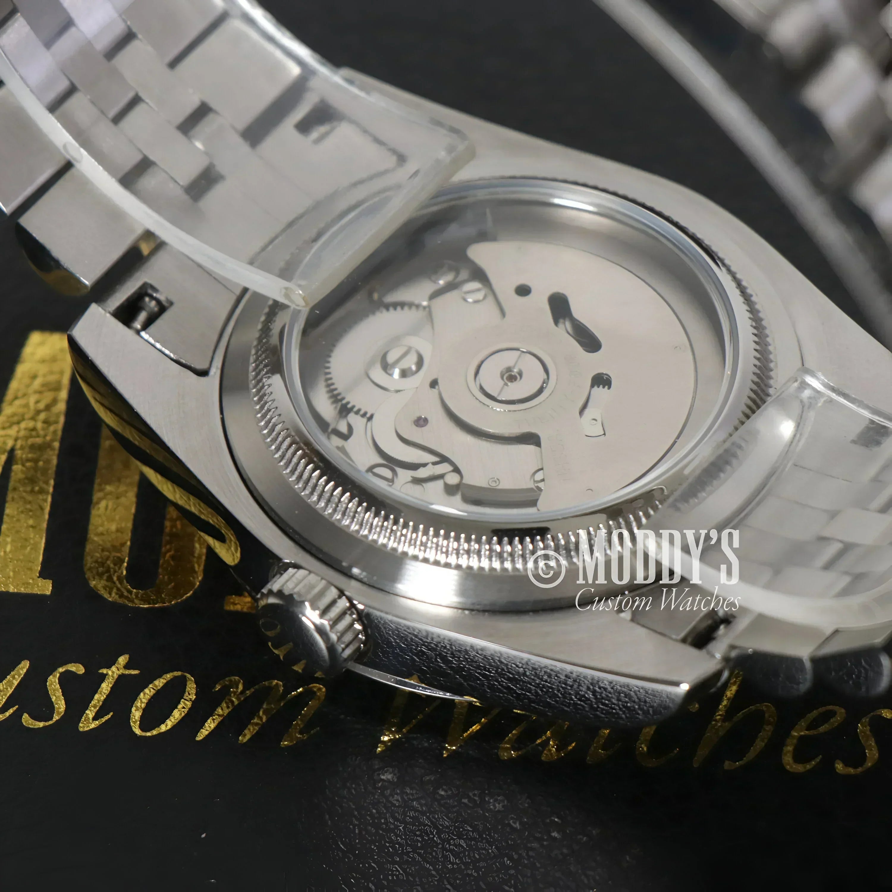 Silver Seikojust Champagne wristwatch with exposed movement and Seiko NH35 automatic features