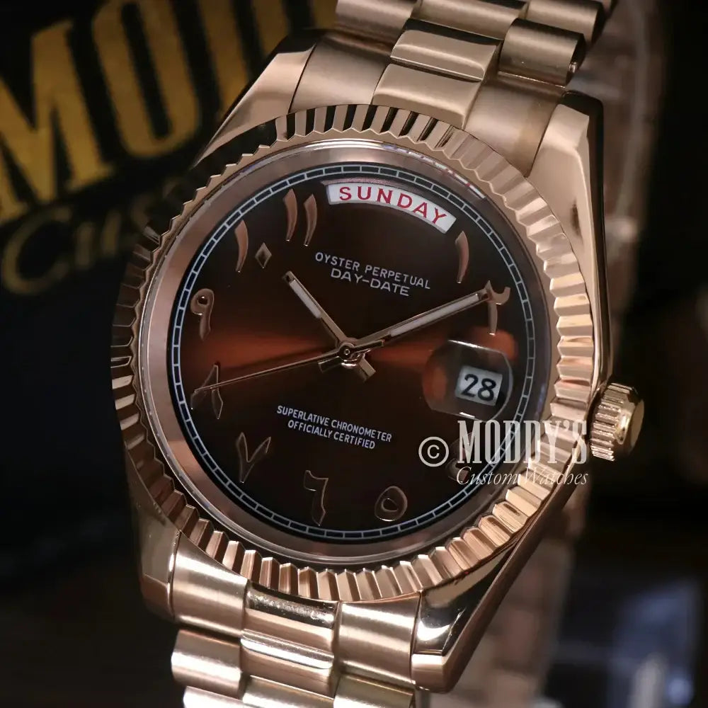 Rose gold wristwatch with Arabic numerals from Seikojust Daydate Rose Gold collection