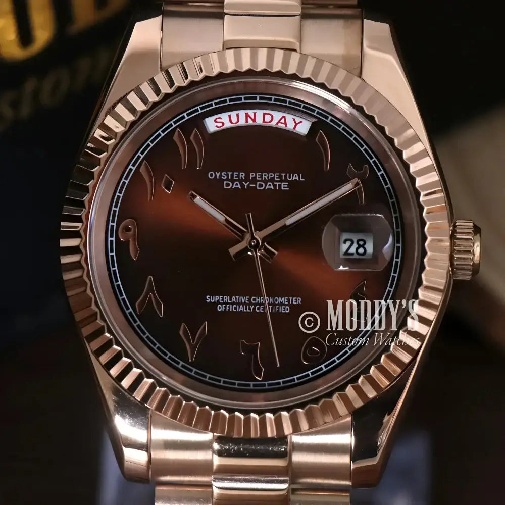 Rose gold wristwatch with Arabic numerals from Seikojust Daydate Rose Gold collection