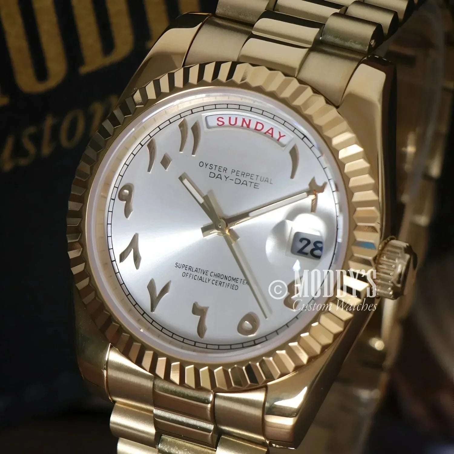 Gold Rolex Day-Date watch with Arabic numerals in Seikojust Daydate Yellow Gold design