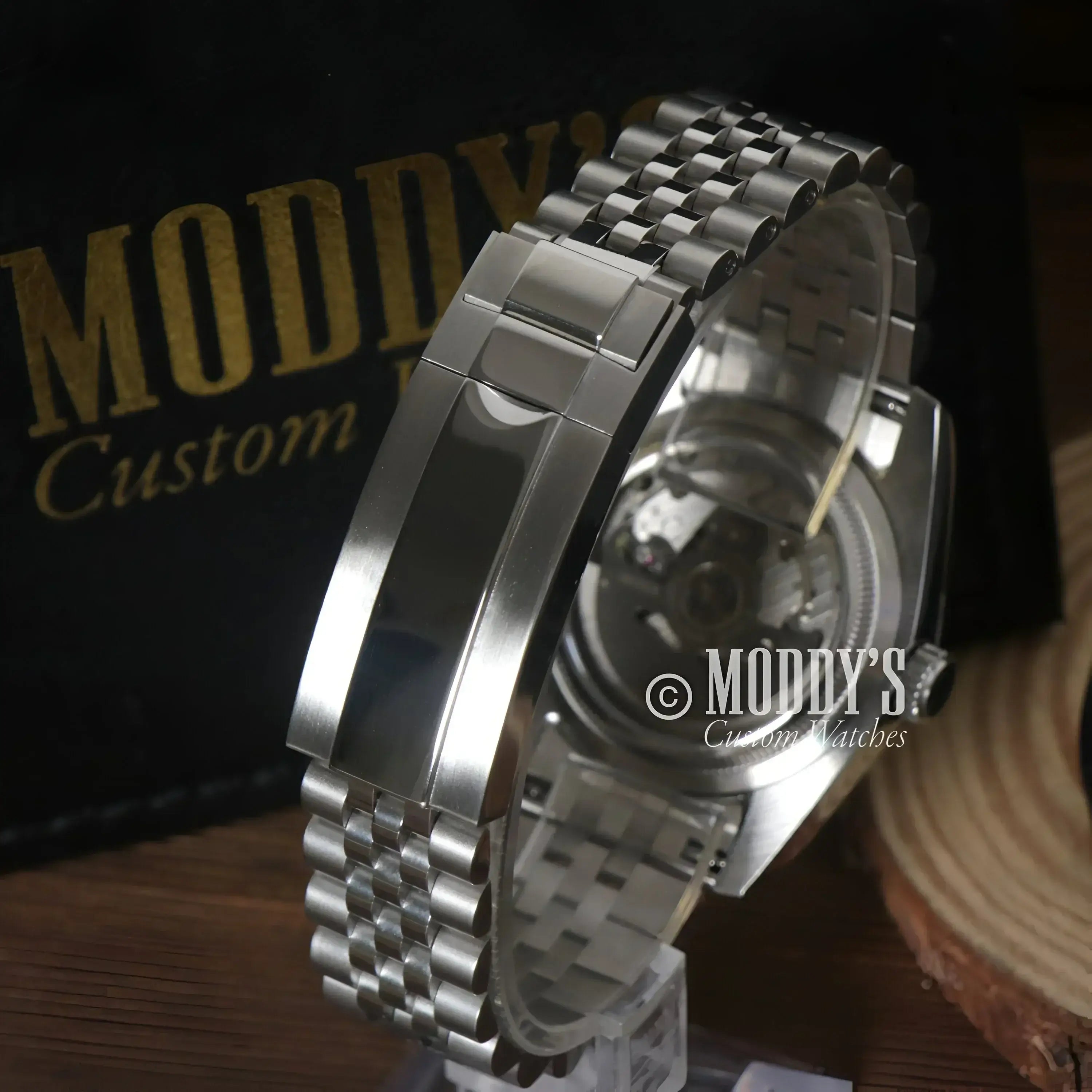 Silver metal Seikojust watch with green Roman dial and NH35 automatic movement