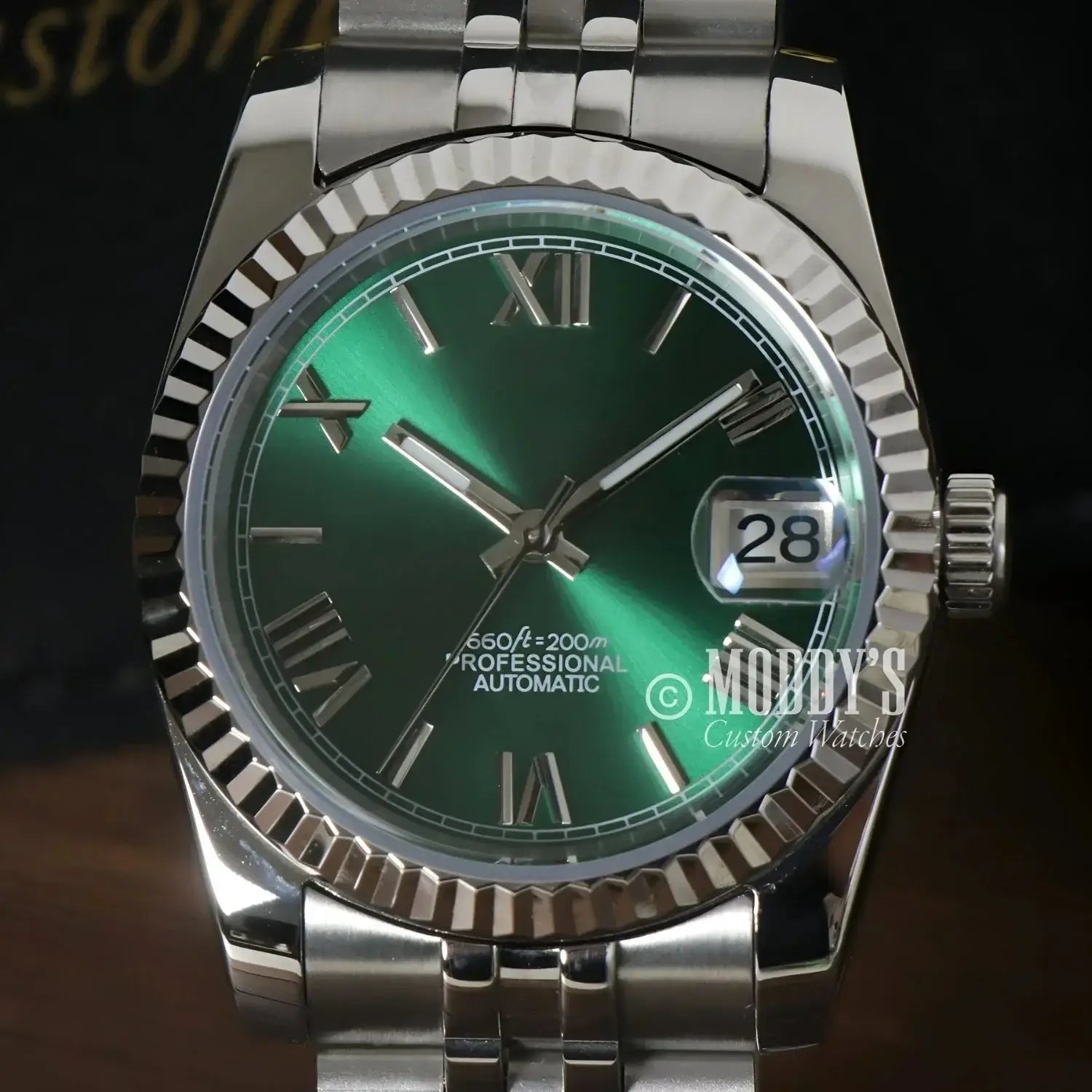 Green-faced Seikojust wristwatch with Roman numerals and NH35 automatic movement
