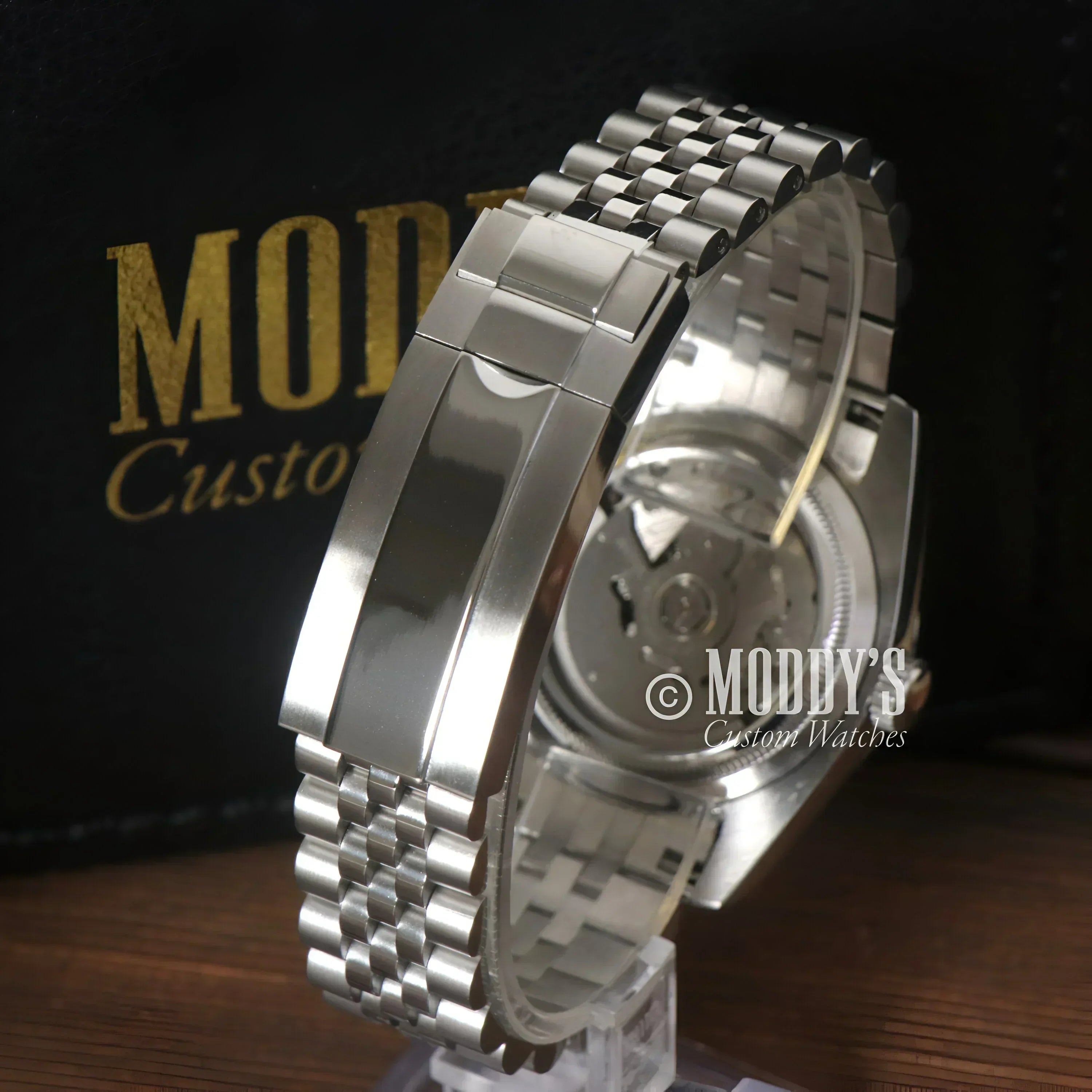 Silver wristwatch with metal band, Seiko Mod Datejust featuring Seiko NH35 automatic movement