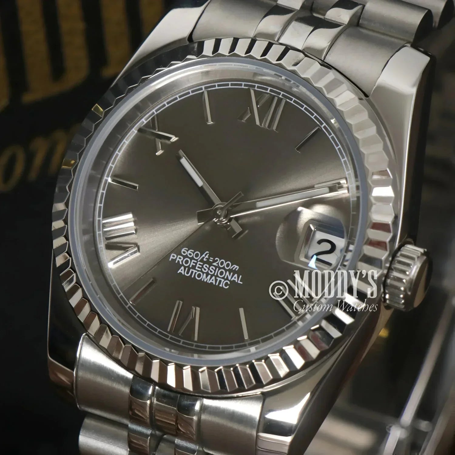 Silver Seiko mod wristwatch with Roman numerals, styled as Roman Champagne