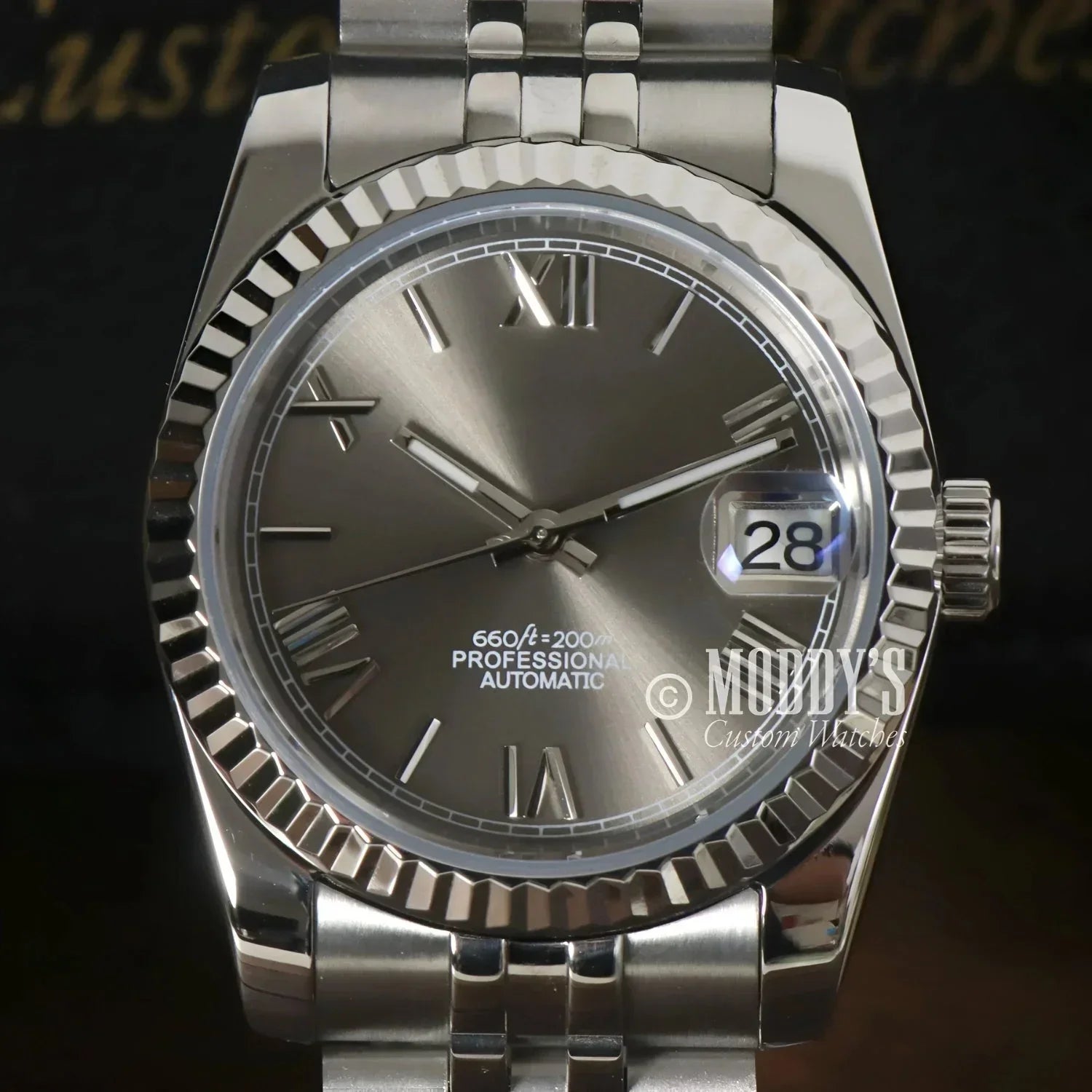 Silver-tone Seiko Mod Datejust wristwatch with Roman numeral markers elegantly displayed