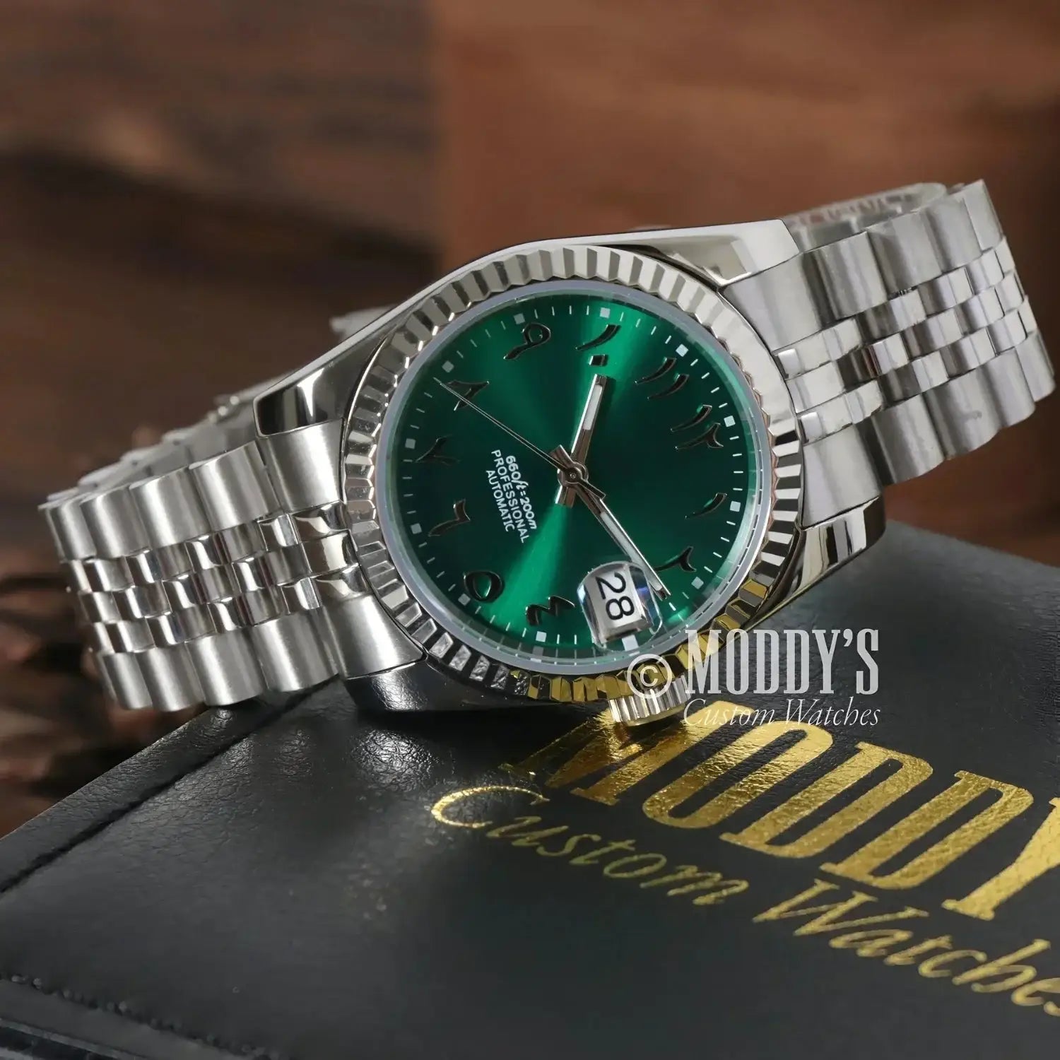 Silver wristwatch with green face, Seiko Mod Datejust Royal Green Arabic, NH35 automatic movement
