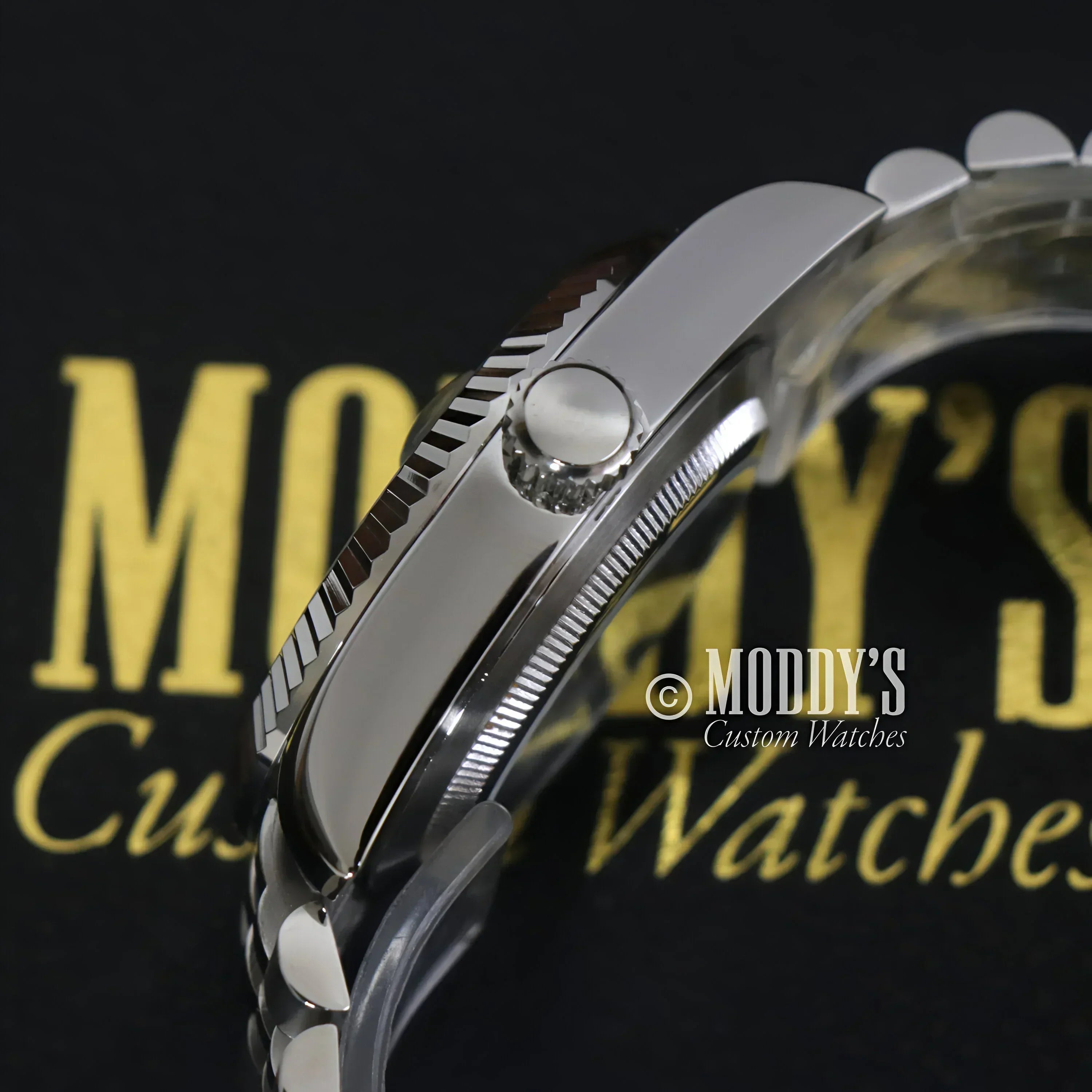 Silver wristwatch with fluted bezel from Seikojust Sky Dweller Mint Green collection