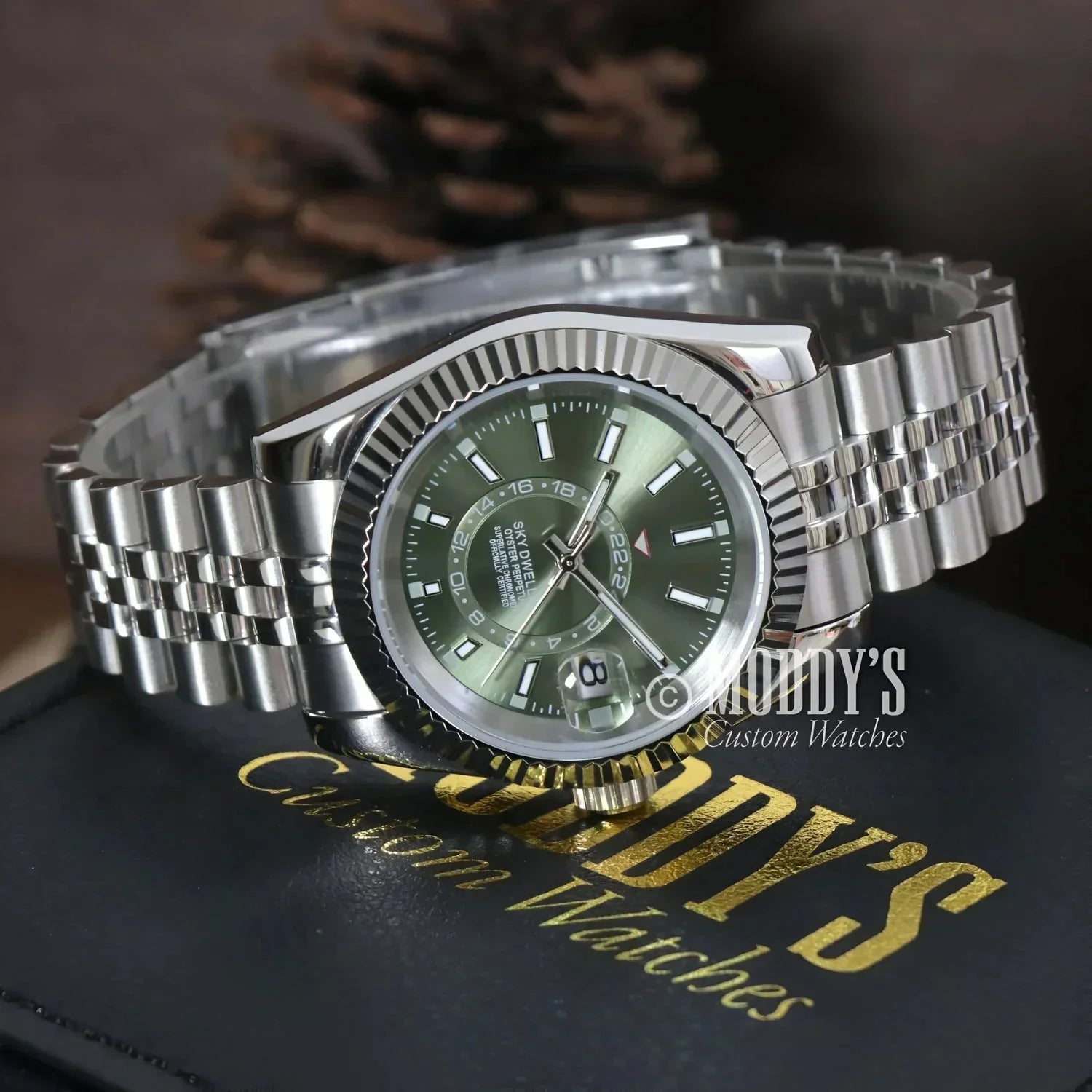 Silver wristwatch with green face from Seikojust Sky Dweller Mint Green, Seiko NH35 automatic