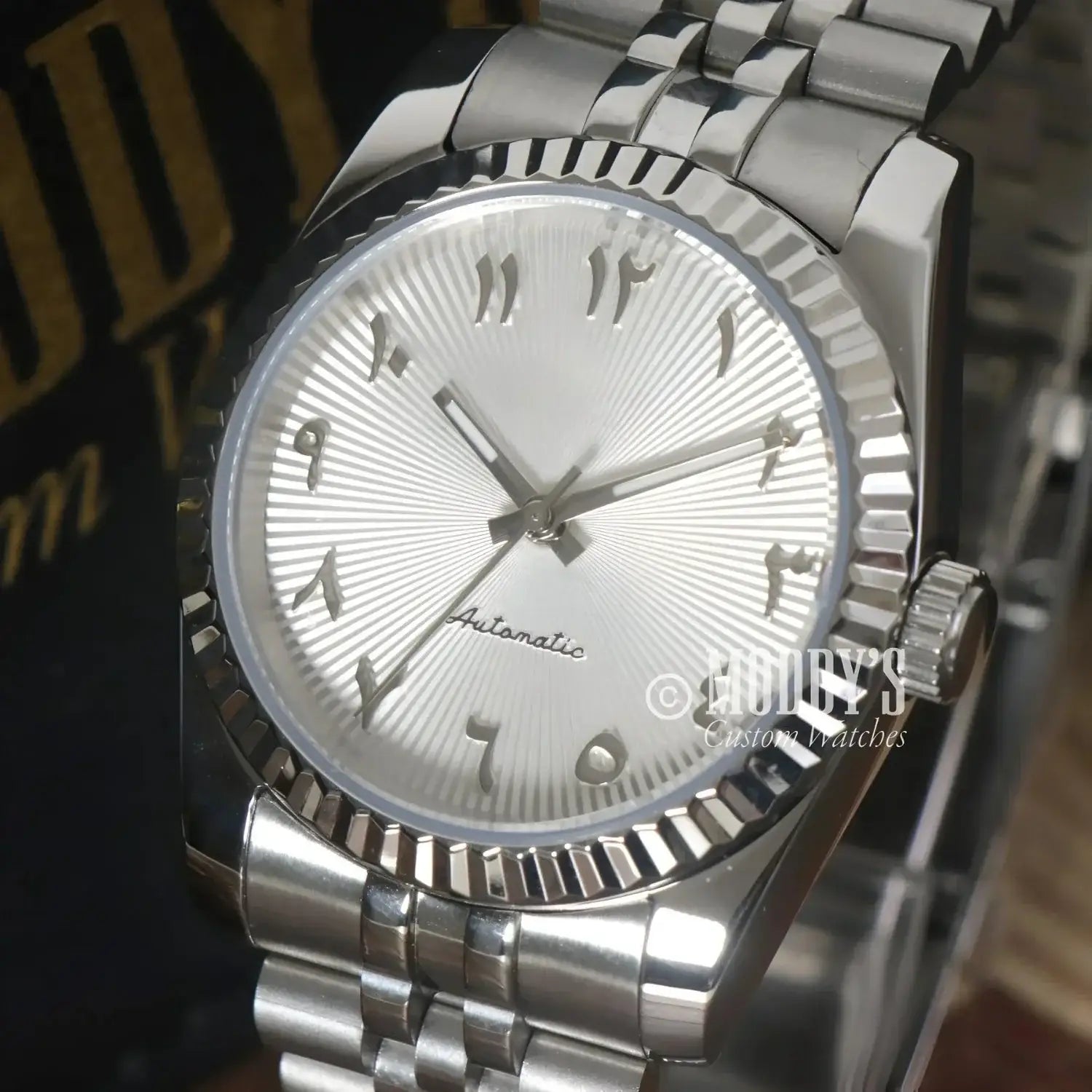 Silver Seikojust wristwatch with Arabic numerals and NH35 automatic movement