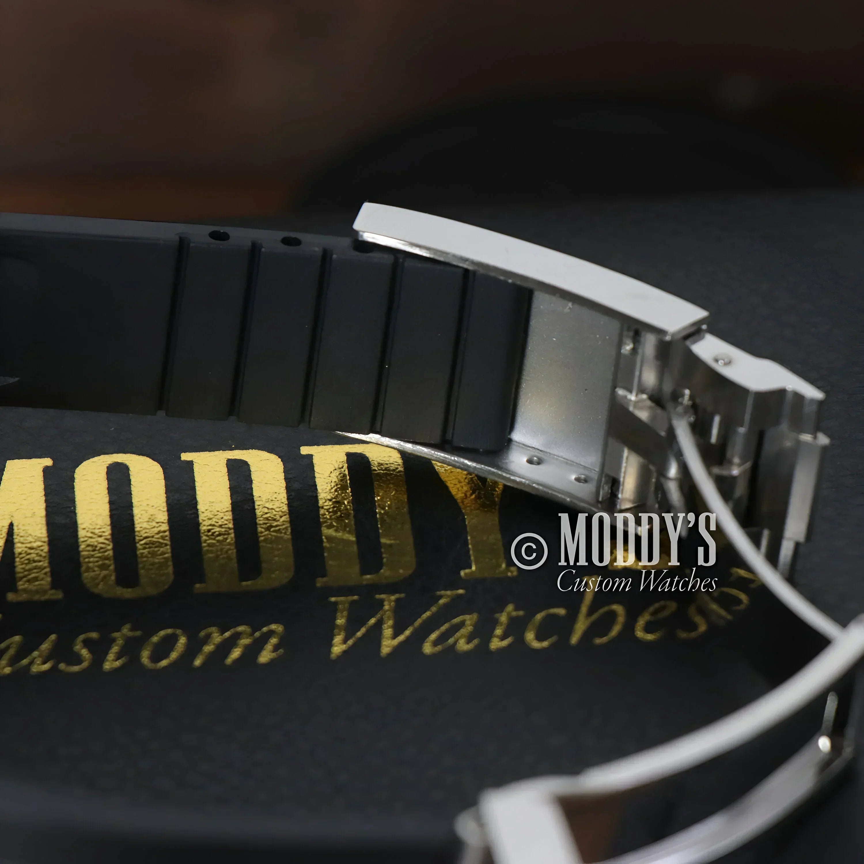 Black watch band with silver clasp for Seikomariner featuring NH35 Automatic movement