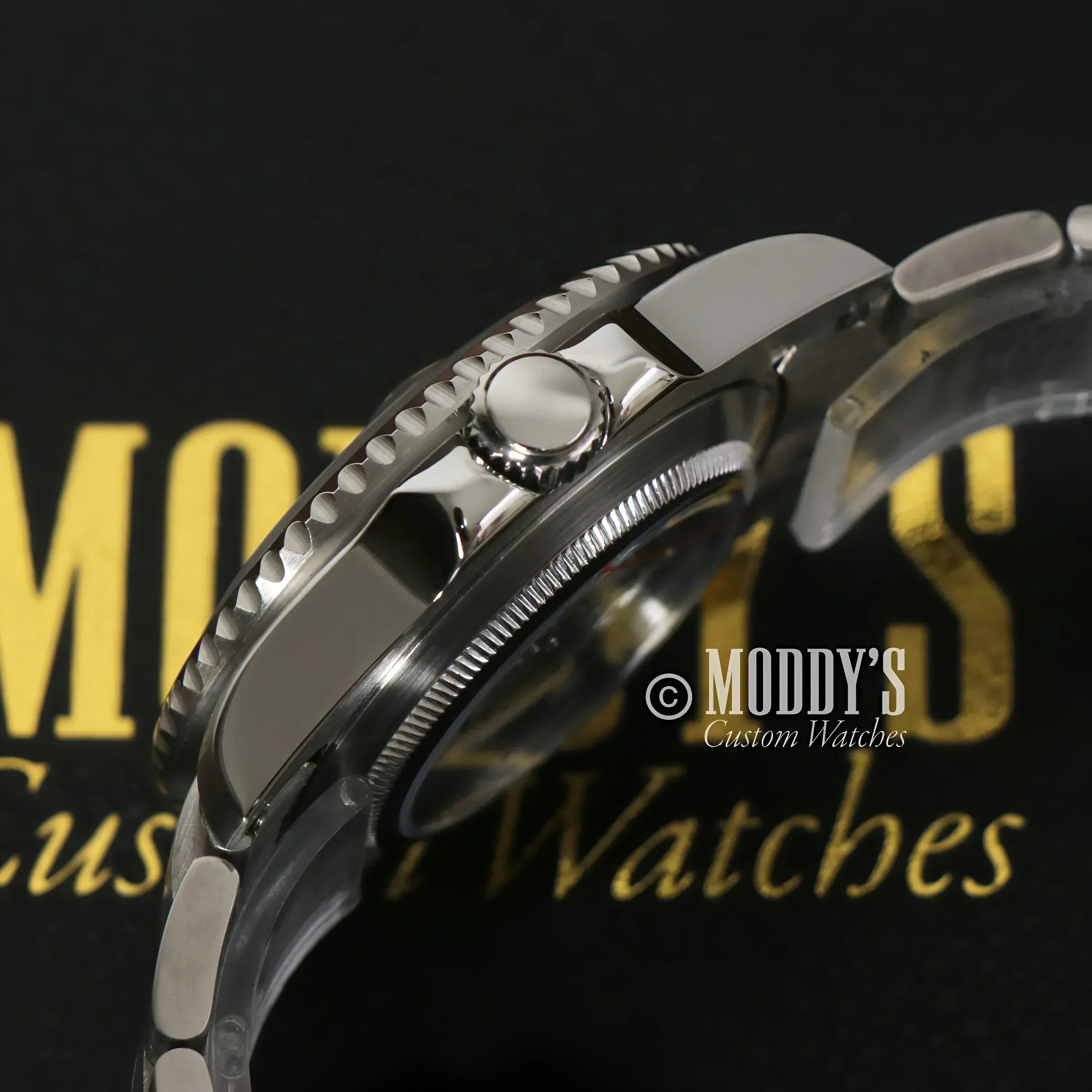 Silver wristwatch with rotating bezel, Seikomariner Black, featuring NH35 automatic movement
