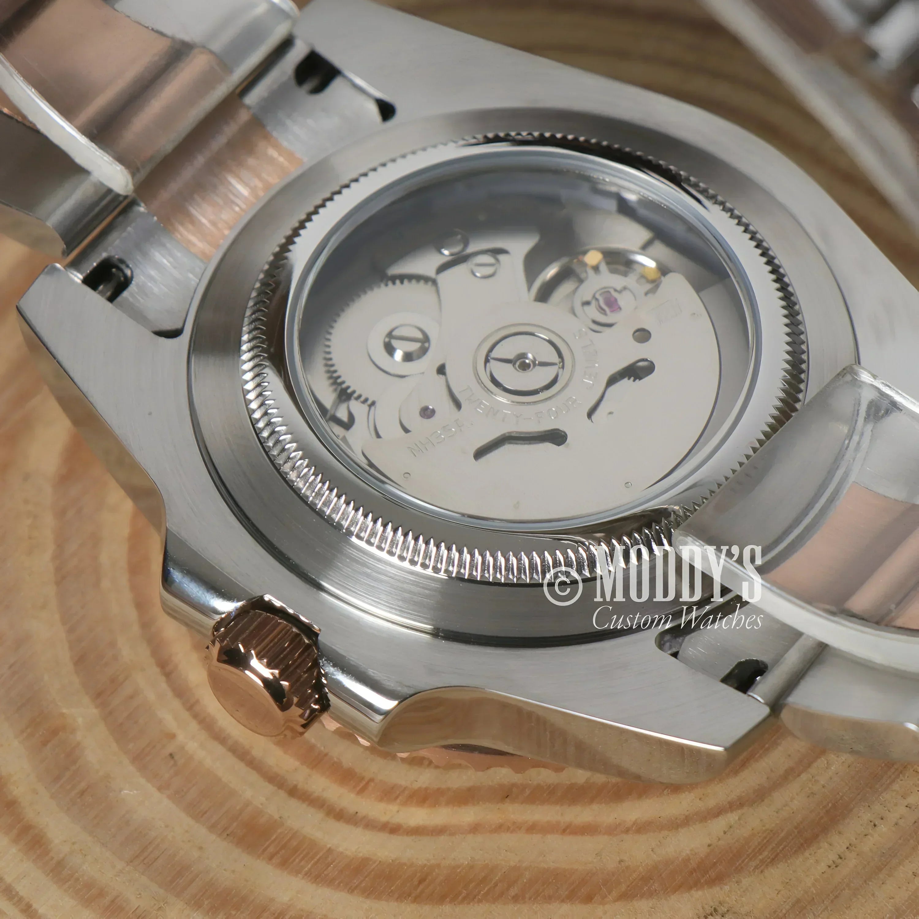 Silver and gold Seikomariner wristwatch showcasing NH35 automatic movement