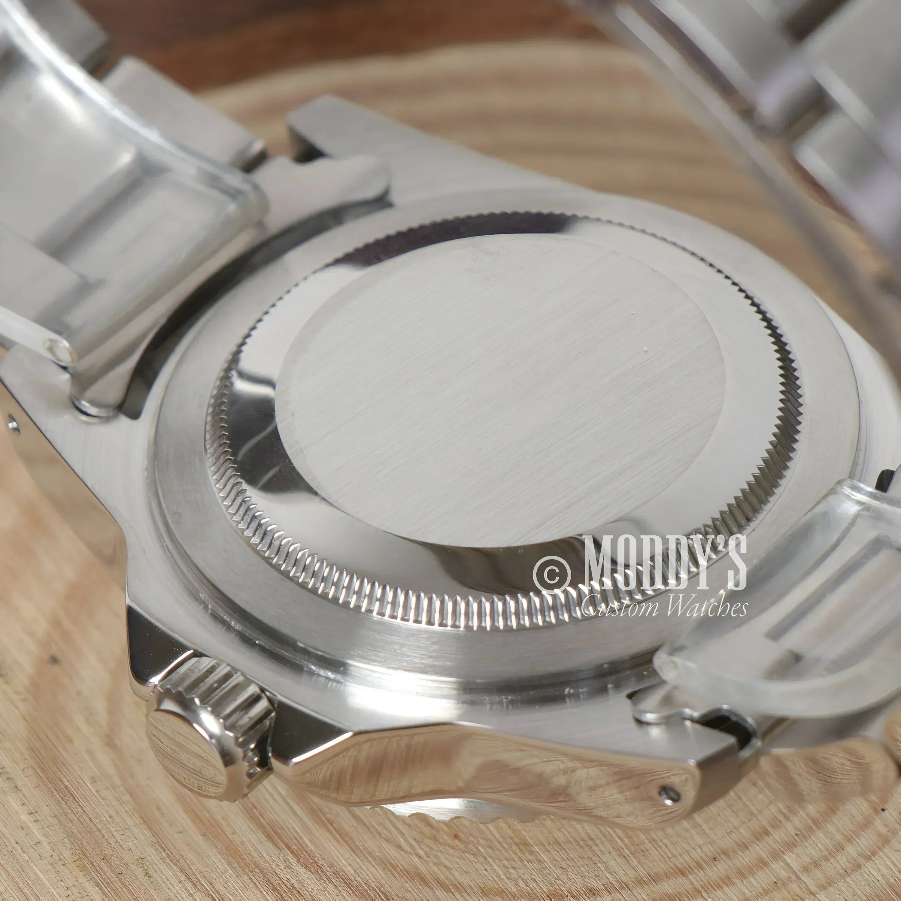 Silver wristwatch back of Seikomariner vintage with Seiko NH35 automatic movement