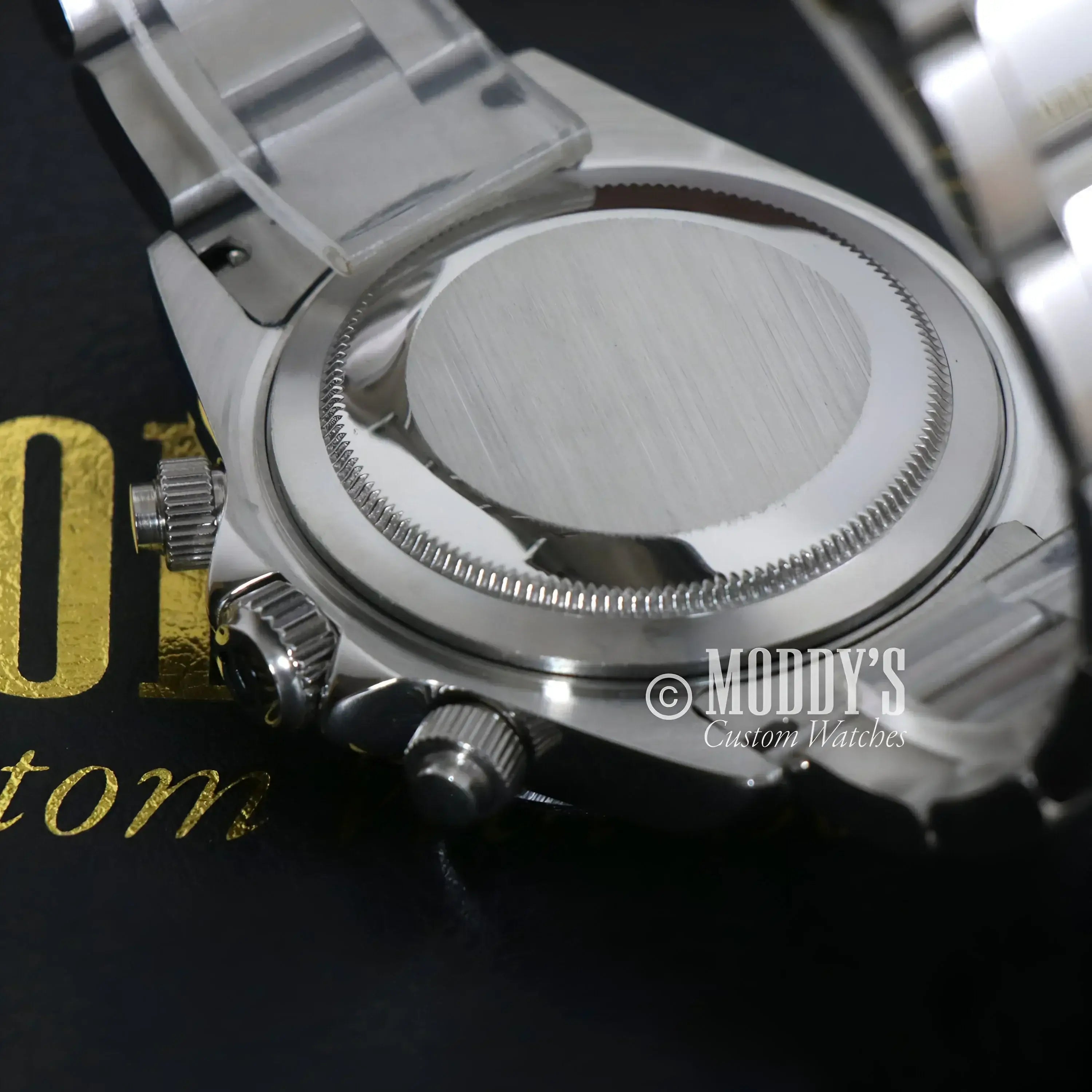 Silver wristwatch back of Seitona Black - White featuring Seiko VK63 Hybrid Movement