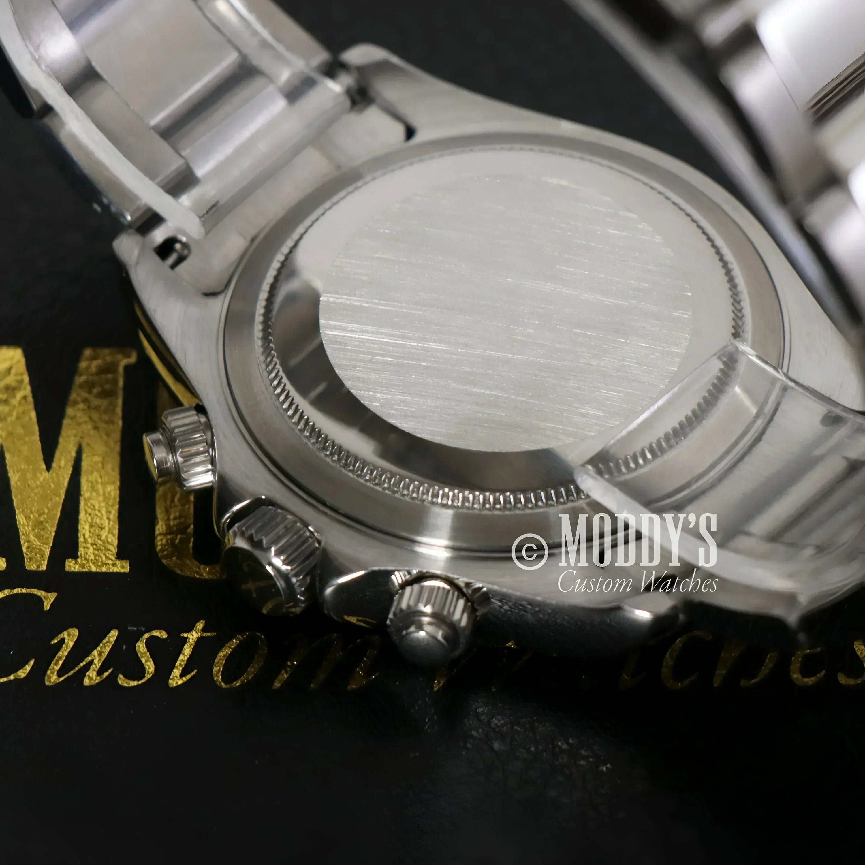 Silver wristwatch back of Seitona Champagne featuring Seiko VK63 hybrid movement
