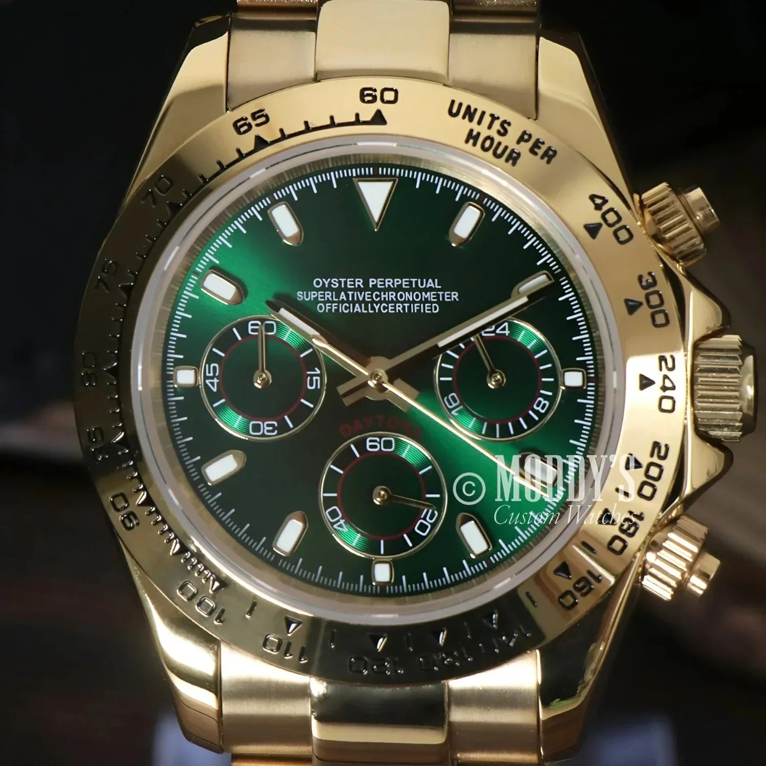 Gold Rolex Daytona with green dial featuring Seiko VK63 hybrid movement in Seitona line