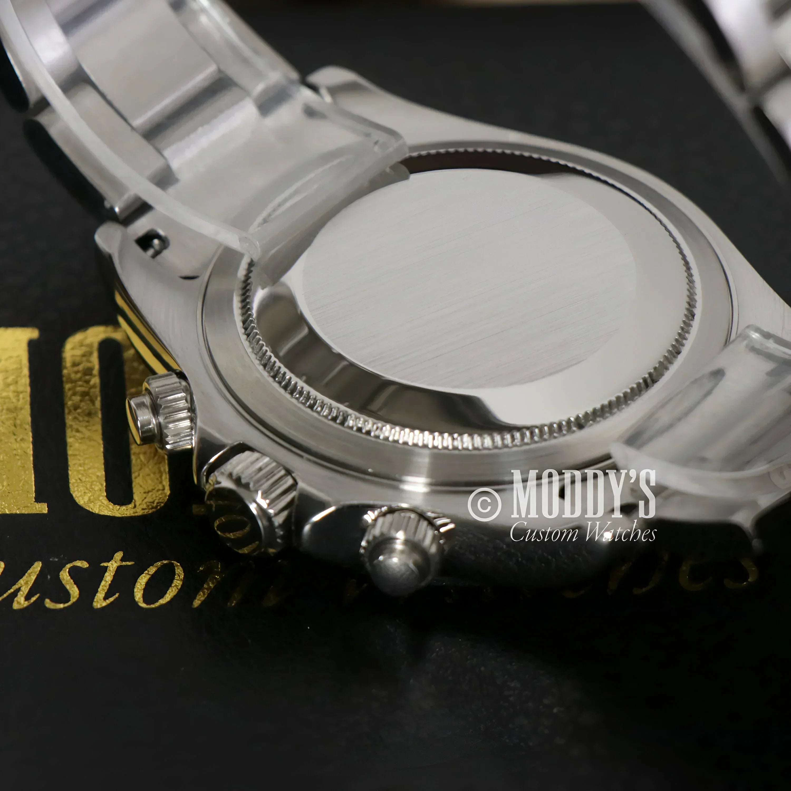 Silver wristwatch with protective plastic from Seitona featuring Ice Blue and VK63 hybrid movement
