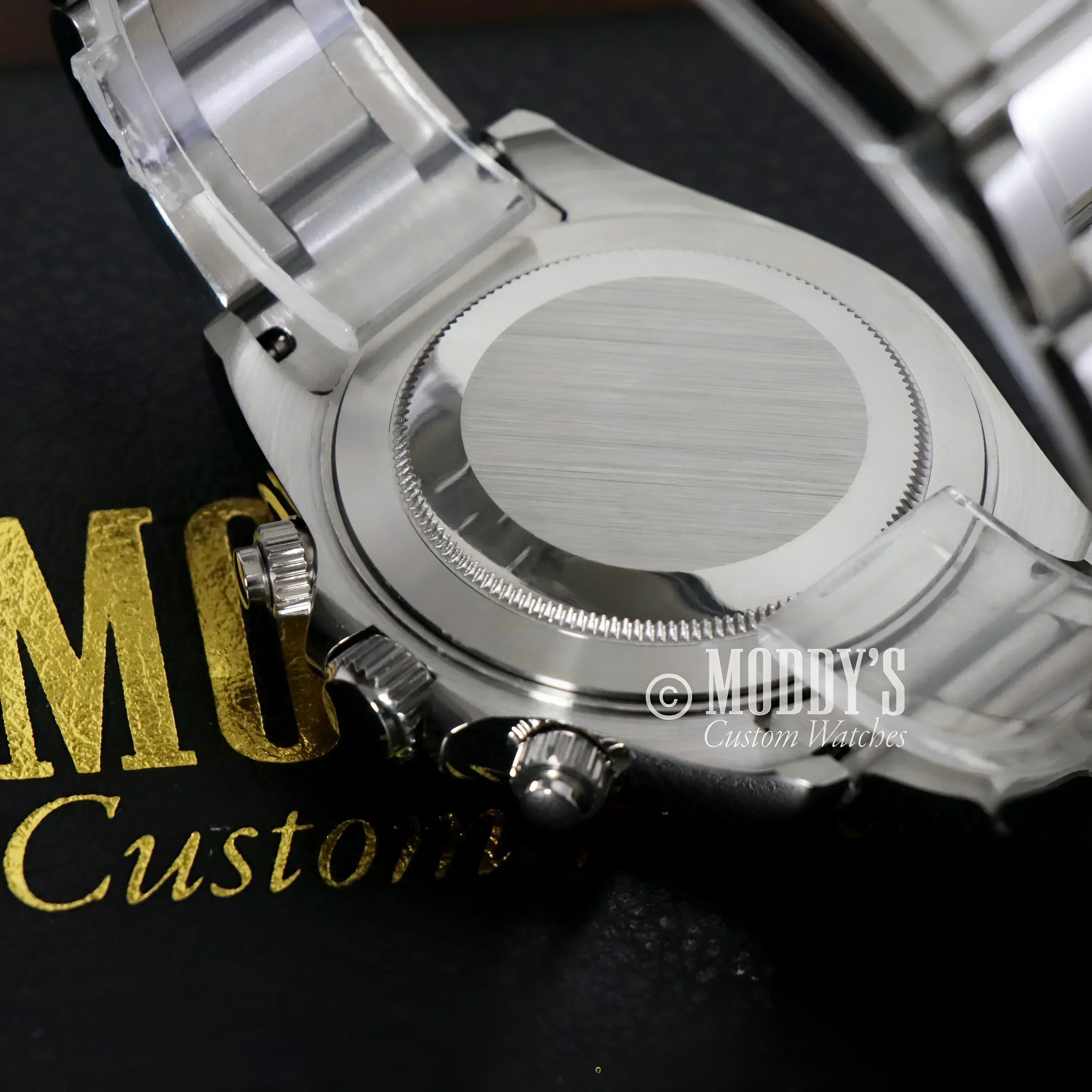 Silver watch back of Seitona Platinum featuring Seiko VK63 hybrid movement