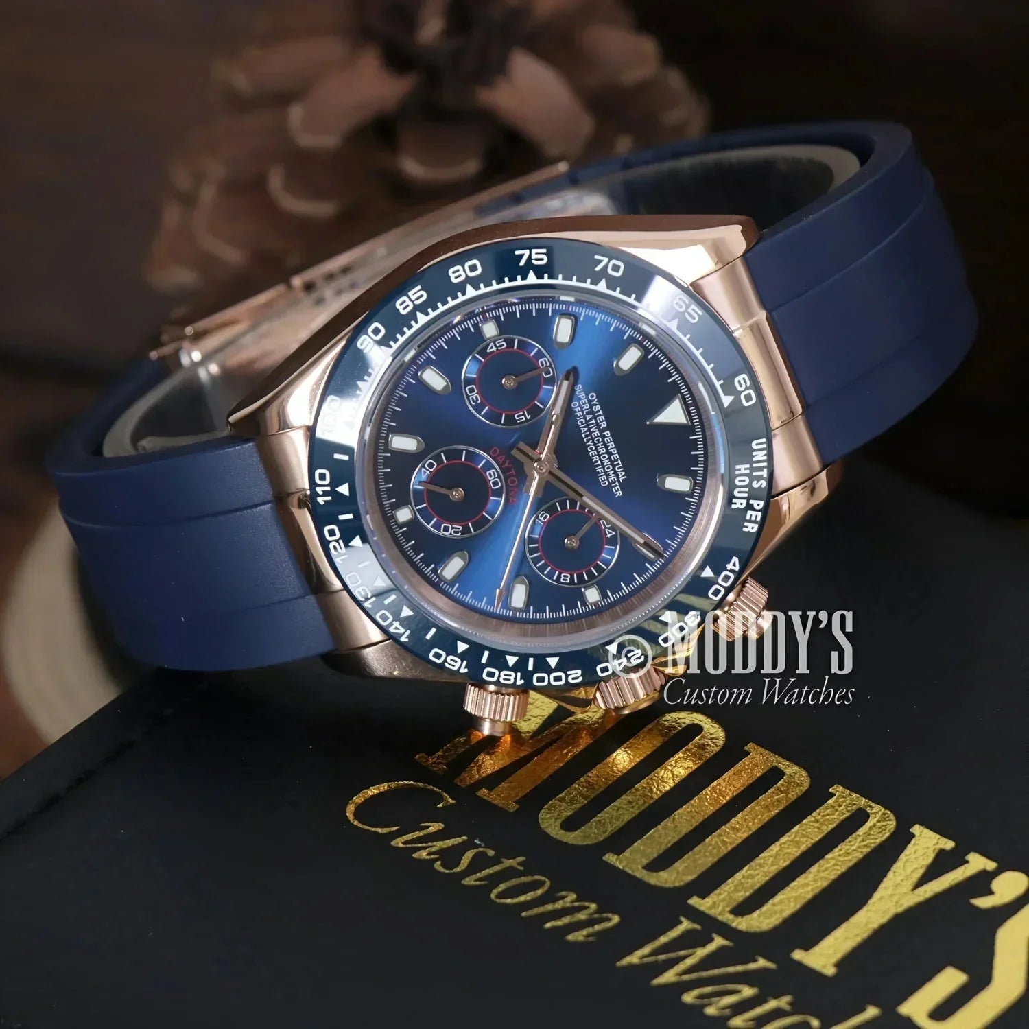 Rose gold wristwatch with blue face and navy band from Seitona Royal Blue, featuring Seiko VK63