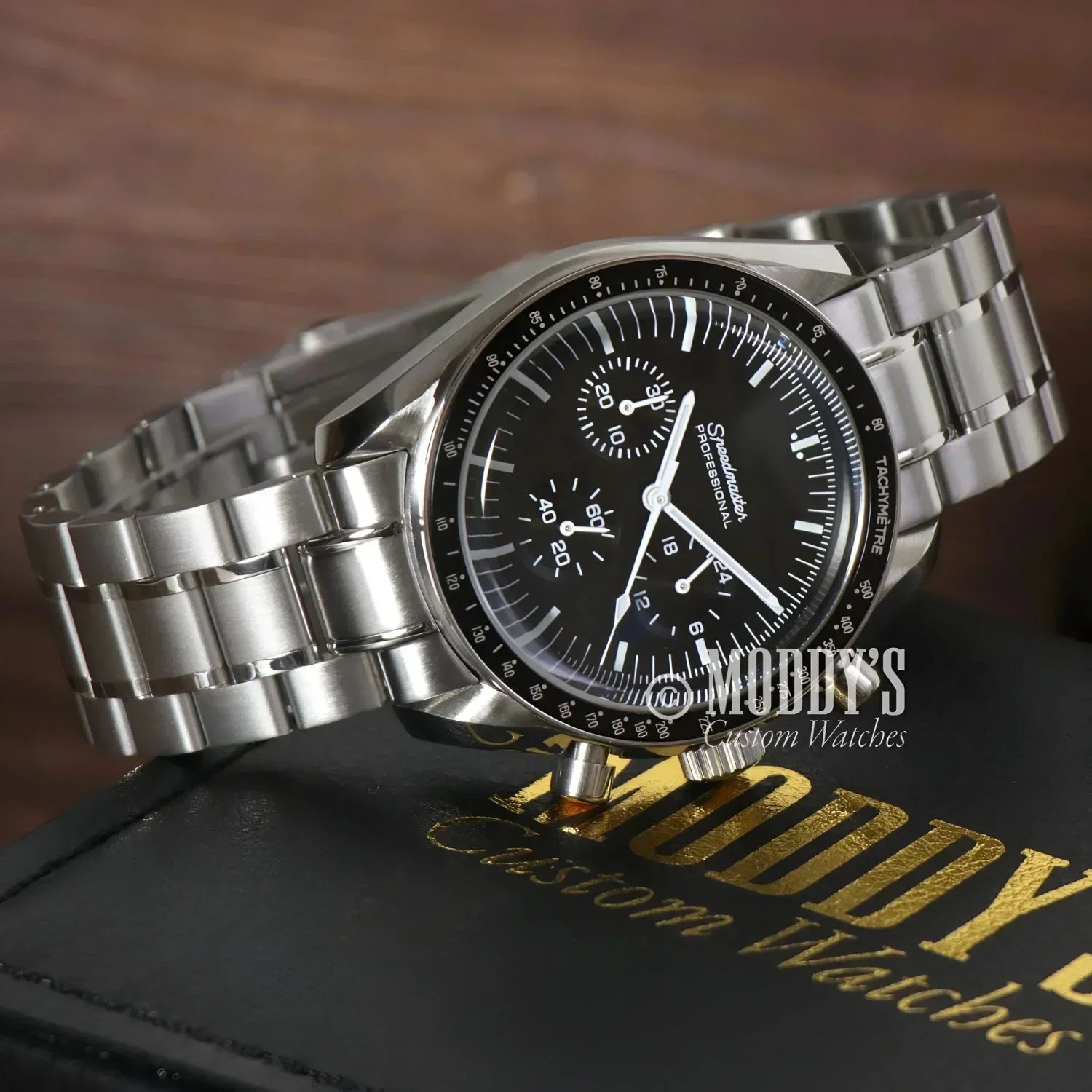 Silver Omega Speedmaster wristwatch in Speedseiko Black featuring Seiko VK63 hybrid movement