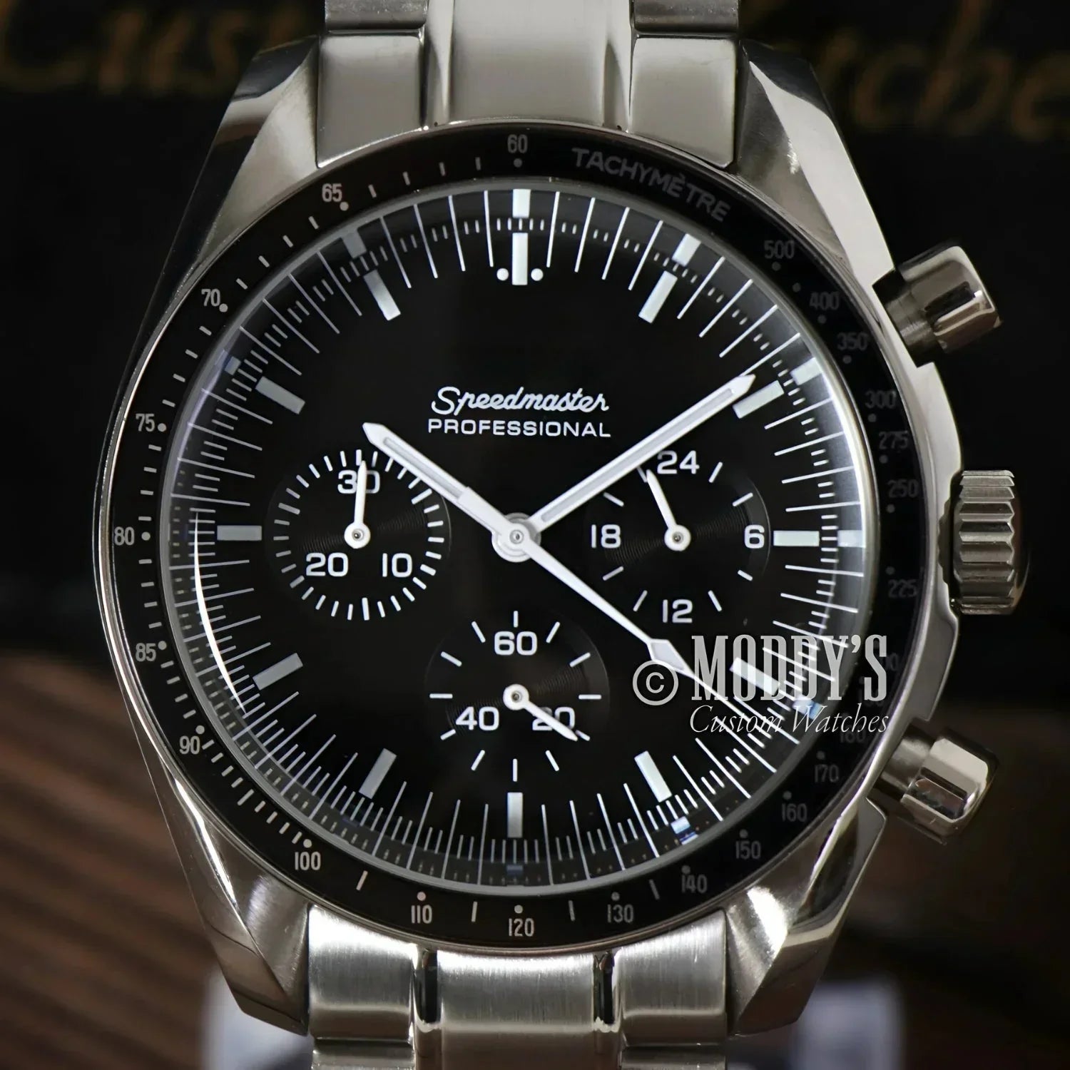 Stainless Steel Speedmaster Professional wristwatch featuring Seiko VK63 Hybrid movement