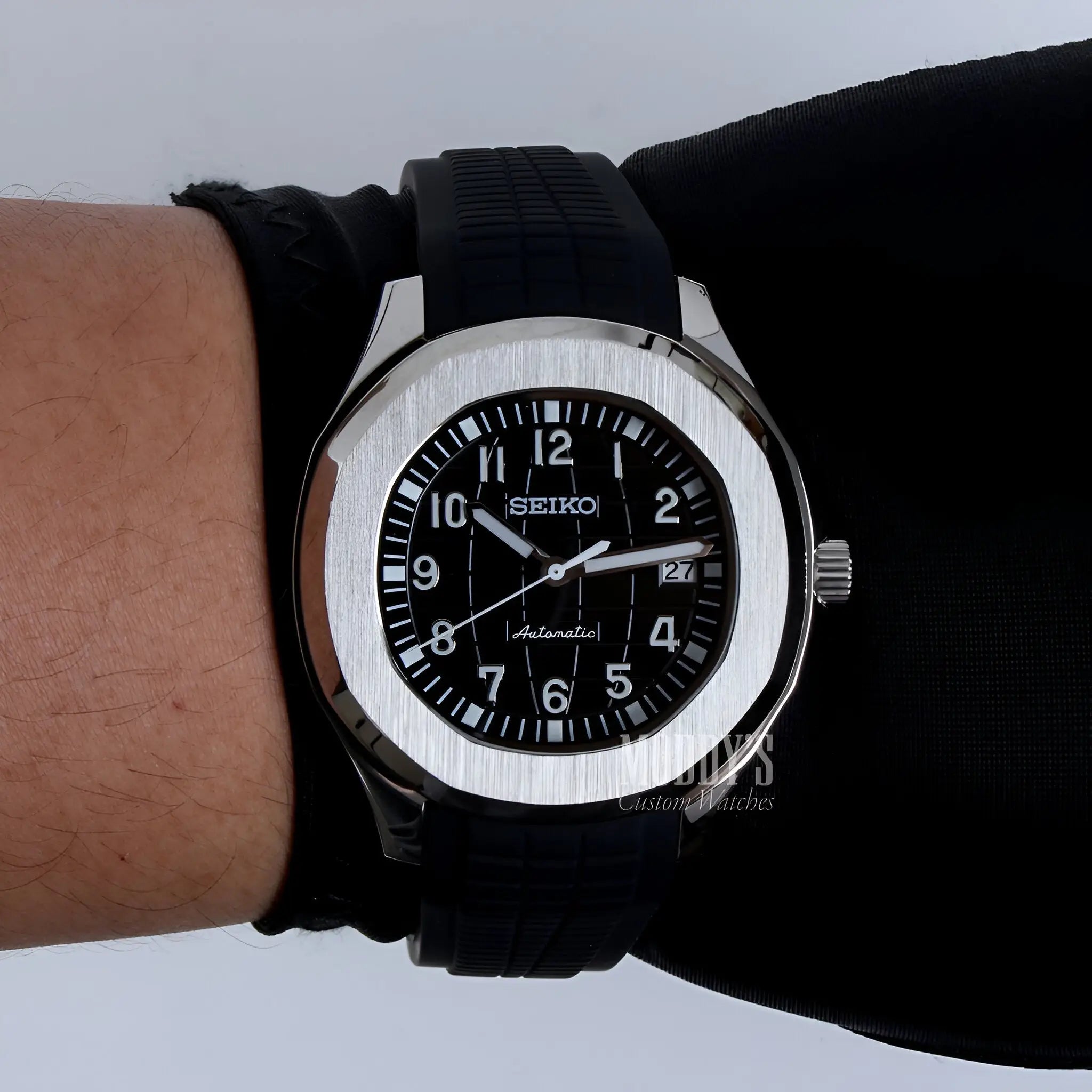 Black Seiko NH35 automatic mod Aquanaut watch with silver accents and date window