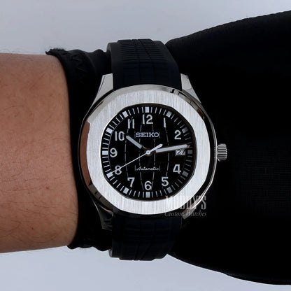 Black Seiko NH35 automatic mod Aquanaut watch with silver accents and date window