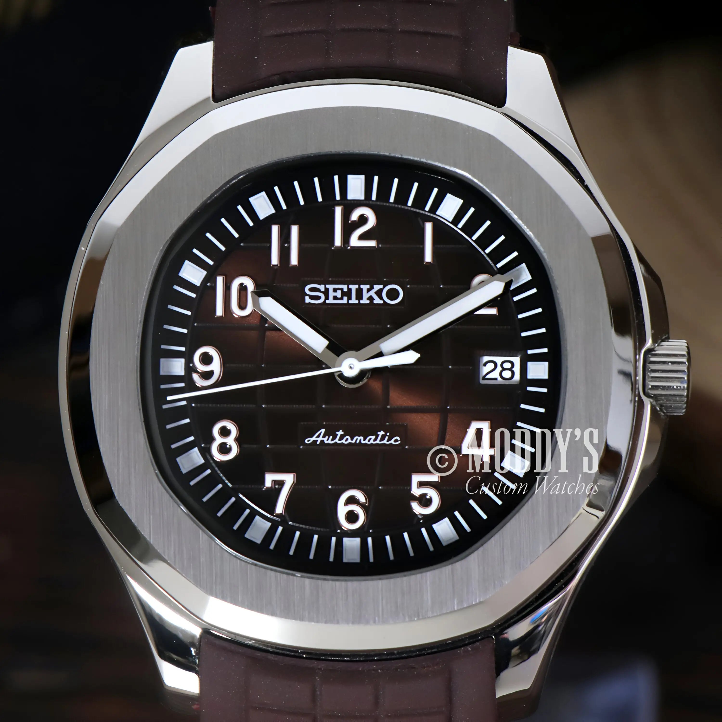 Seiko mod aquanaut watch with brown leather strap and black dial